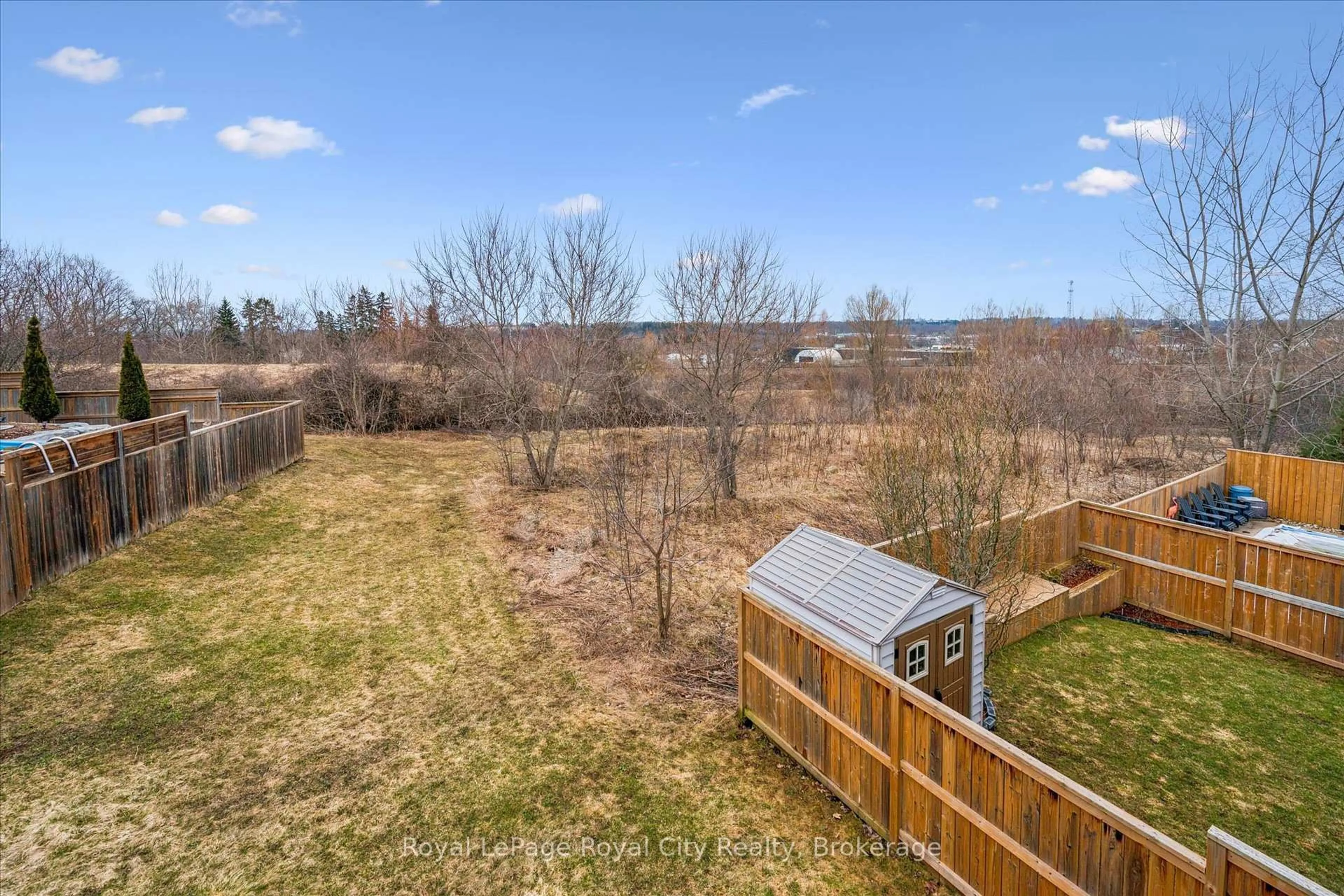 A pic from outside/outdoor area/front of a property/back of a property/a pic from drone, water/lake/river/ocean view for 11 Valleyhaven Lane, Guelph Ontario N1E 0A3