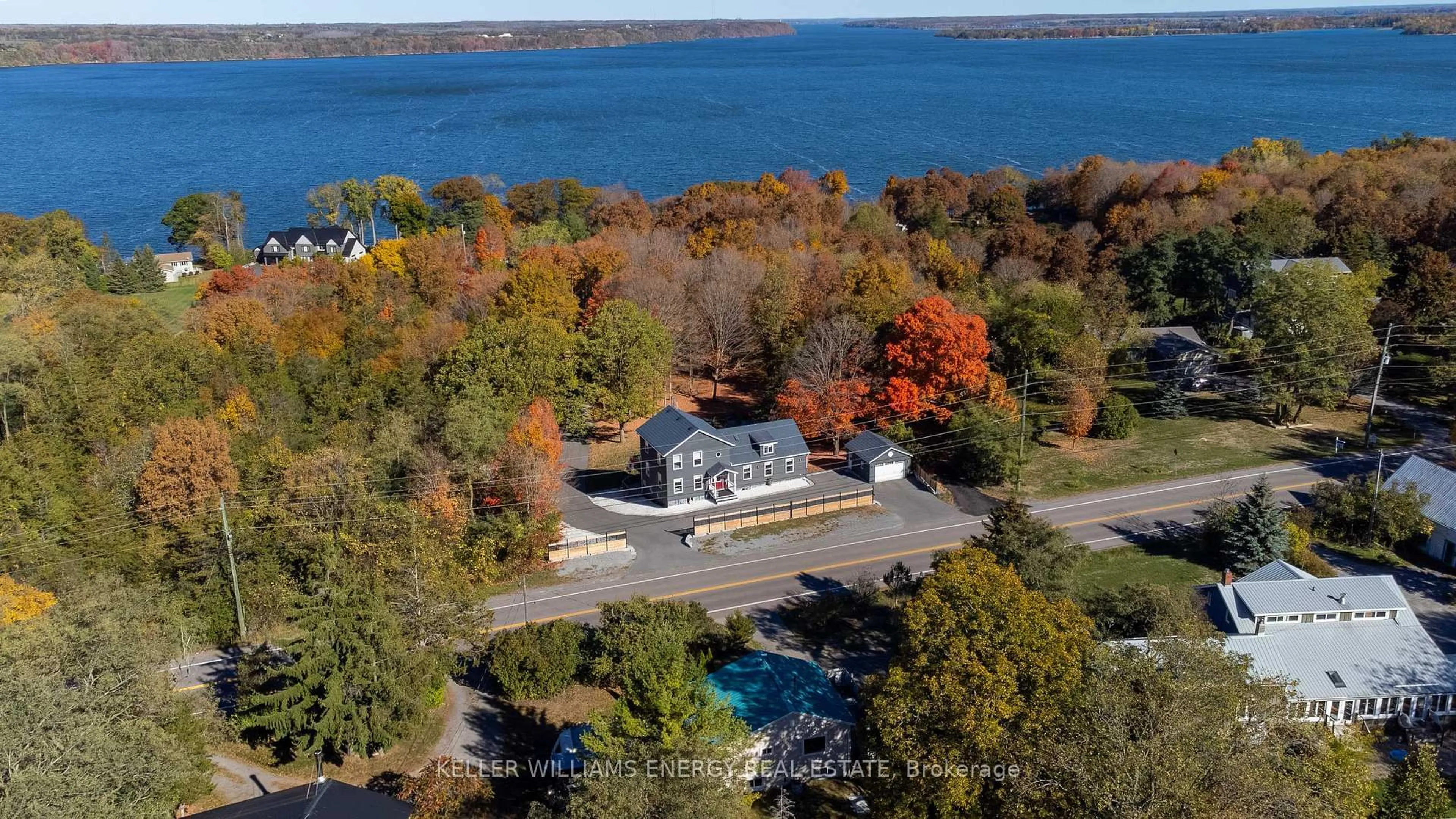 A pic from outside/outdoor area/front of a property/back of a property/a pic from drone, water/lake/river/ocean view for 11858 Loyalist Pkwy, Prince Edward County Ontario K0K 2T0