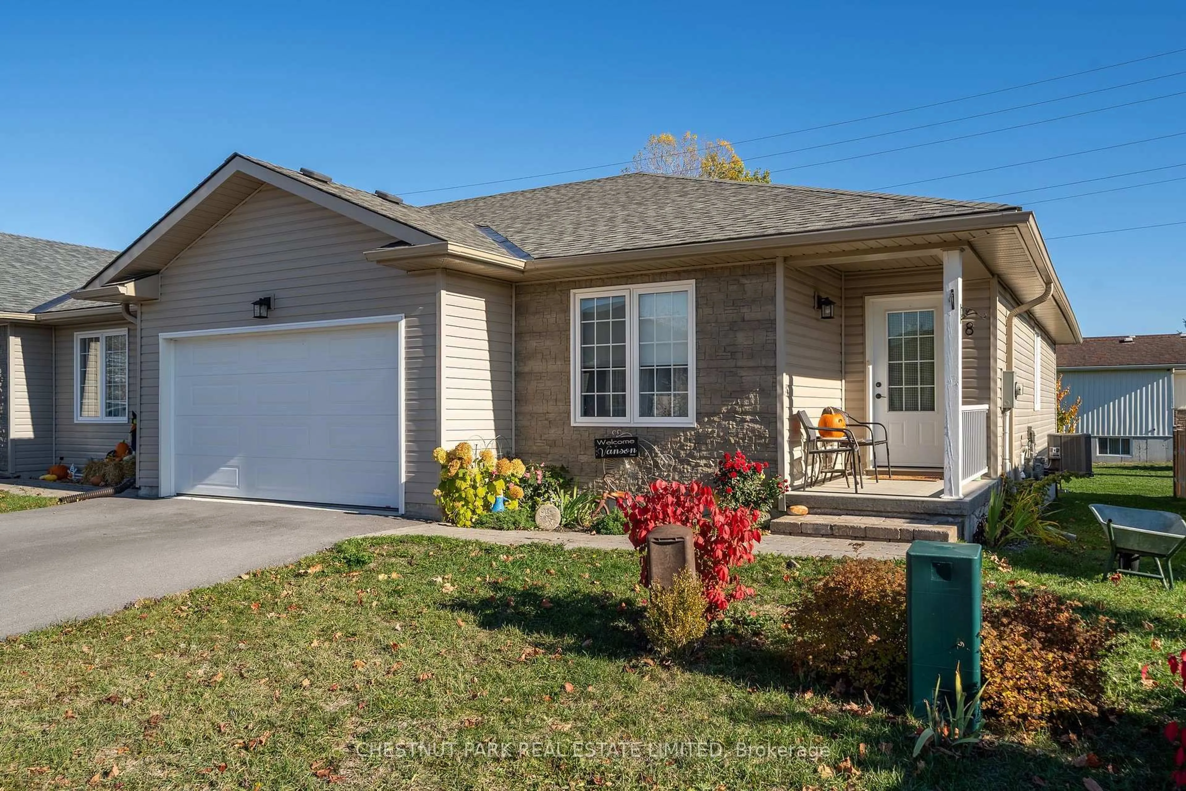 Home with vinyl exterior material, street for 8 Abbott Lane, Prince Edward County Ontario K0K 2T0