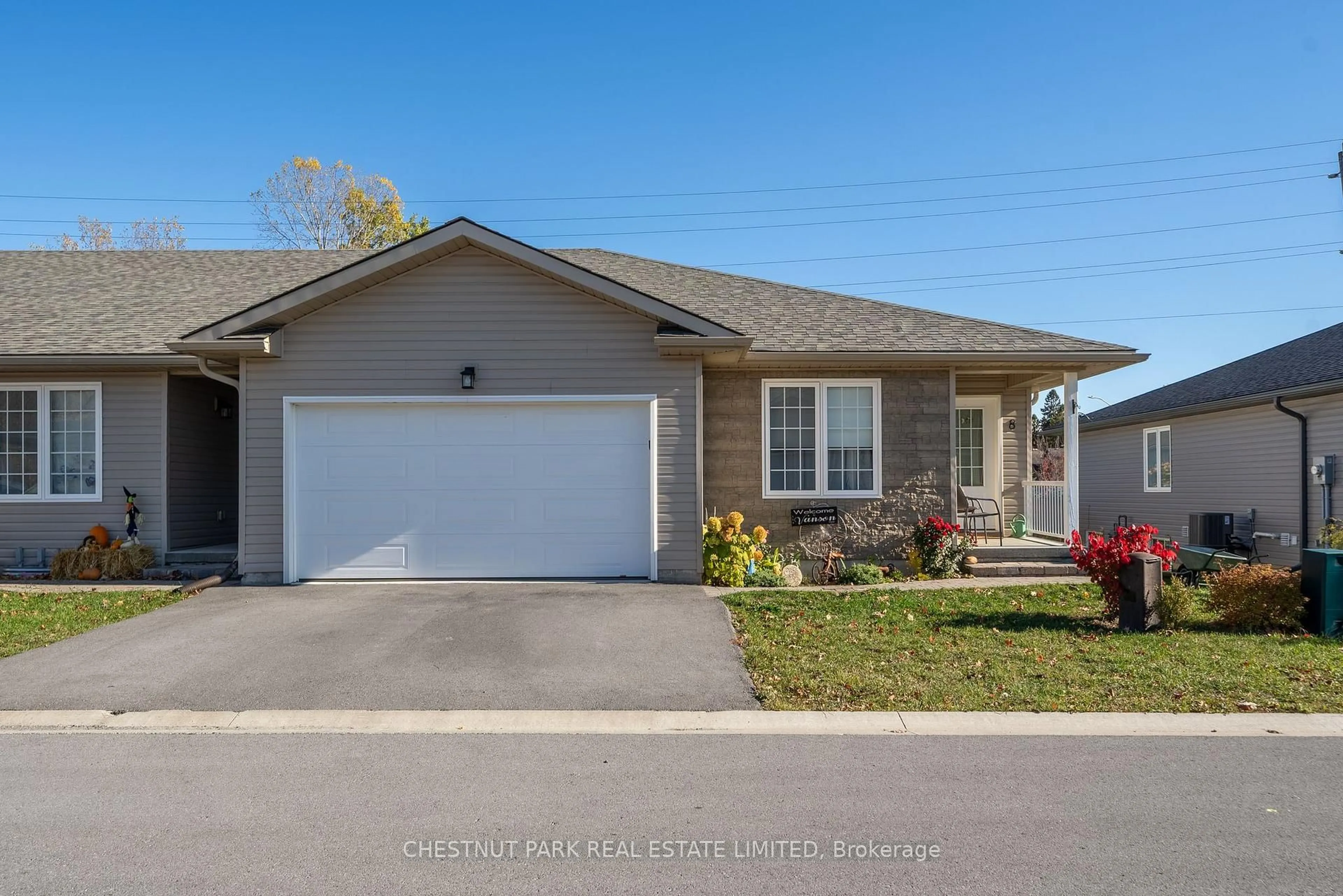 Home with vinyl exterior material, street for 8 Abbott Lane, Prince Edward County Ontario K0K 2T0
