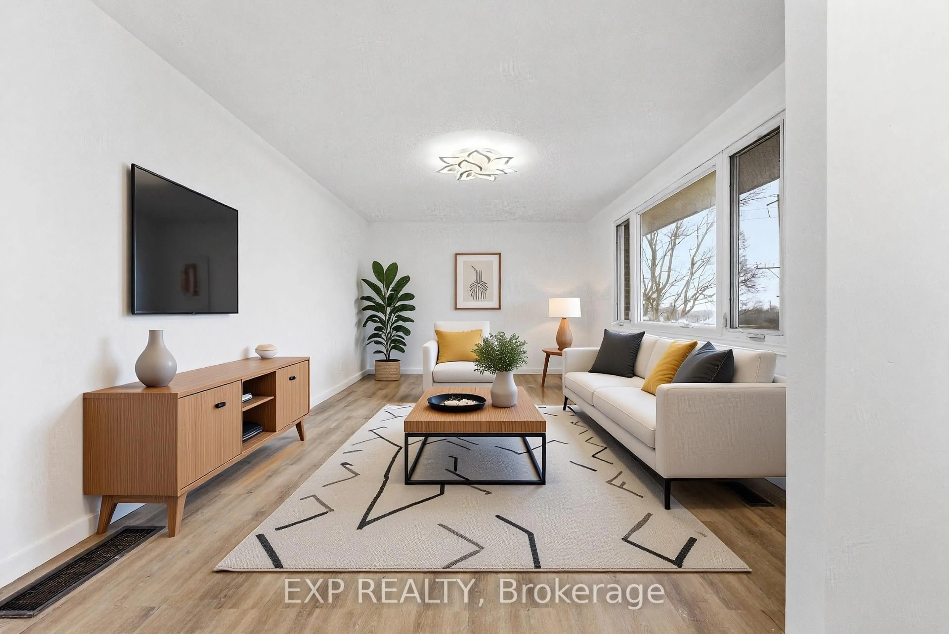 Living room with furniture, wood/laminate floor for 696 Whites Rd, Trenton Ontario K8V 5P8