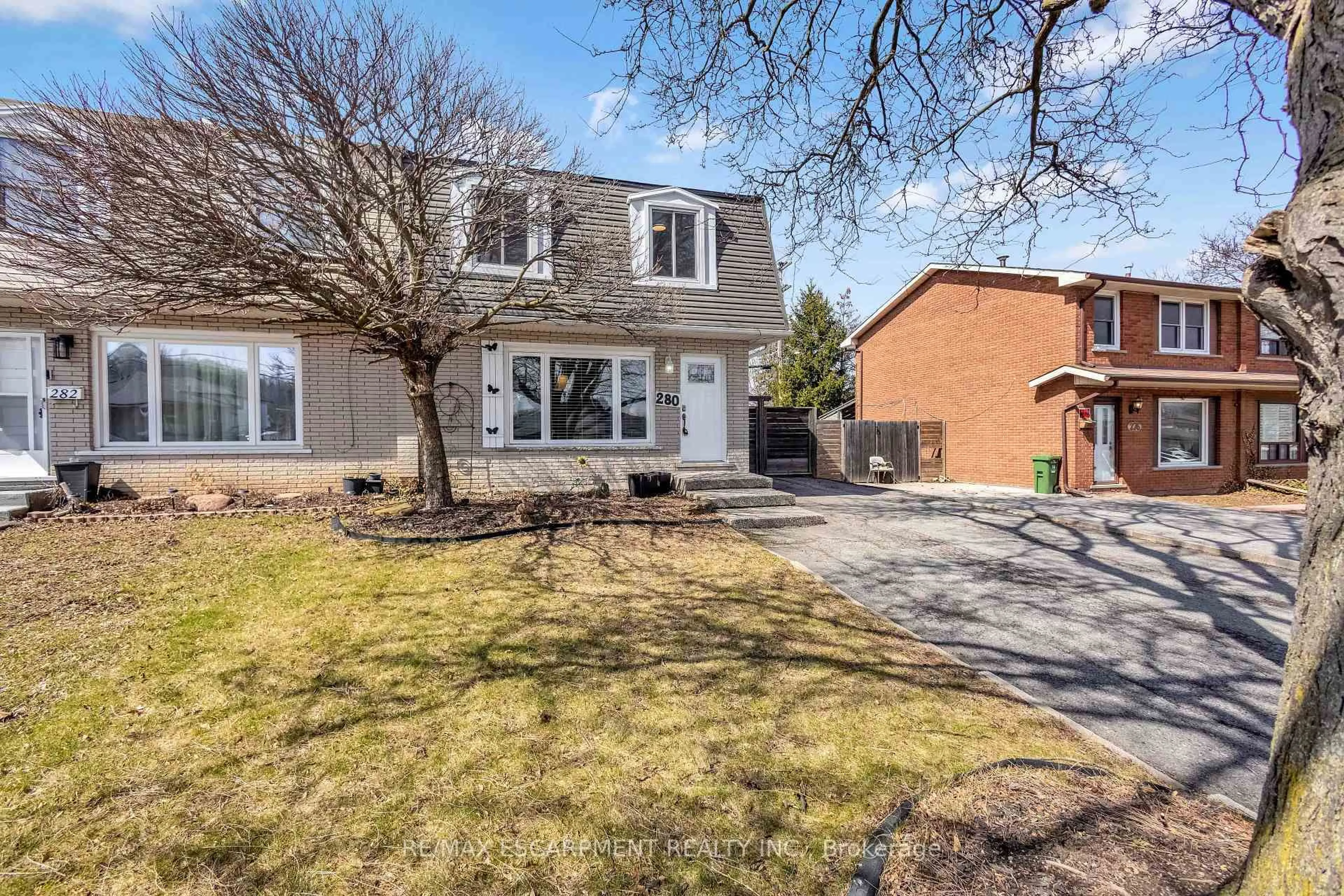 Home with brick exterior material, street for 280 Quigley St, Hamilton Ontario L8K 5N1