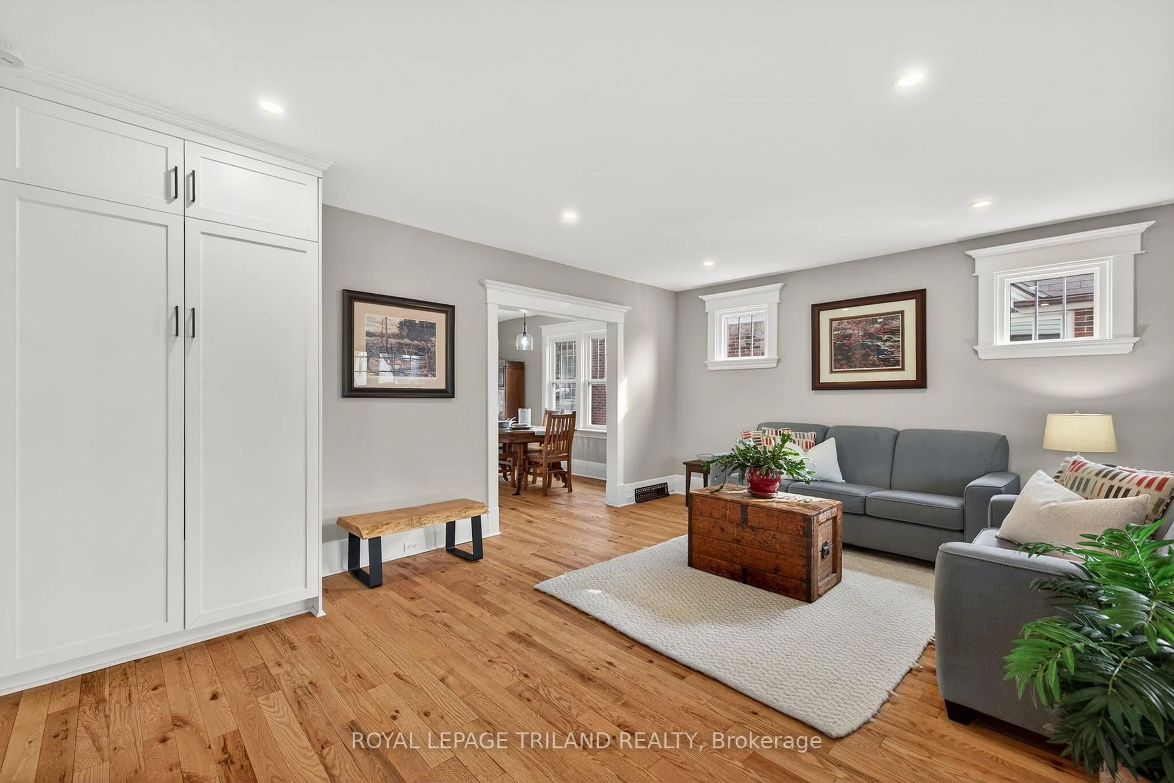 Living room with furniture, wood/laminate floor for 430 Mckenzie Ave, London South Ontario N6C 1V4