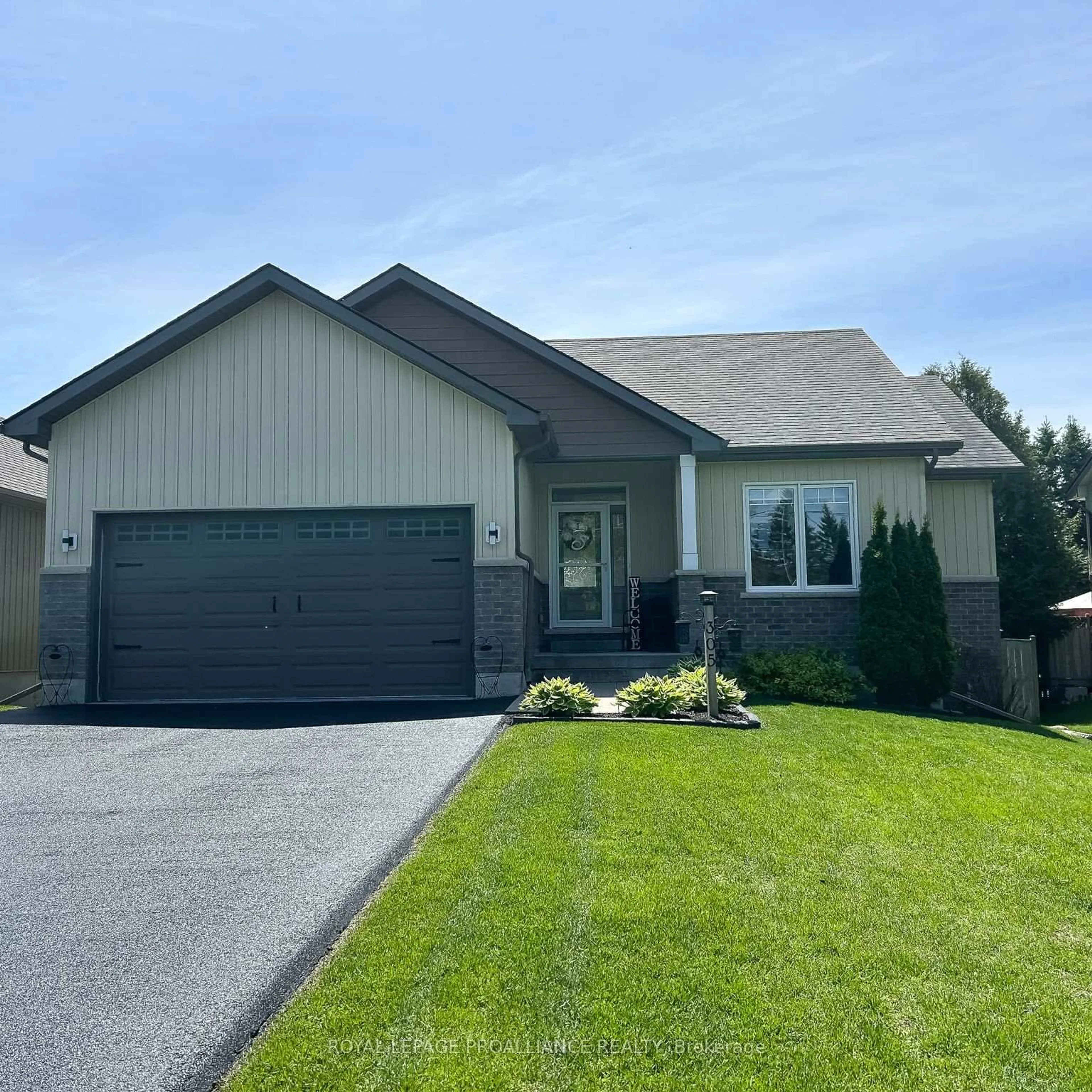Home with vinyl exterior material, street for 305 Raglan St, Brighton Ontario K0K 1H0