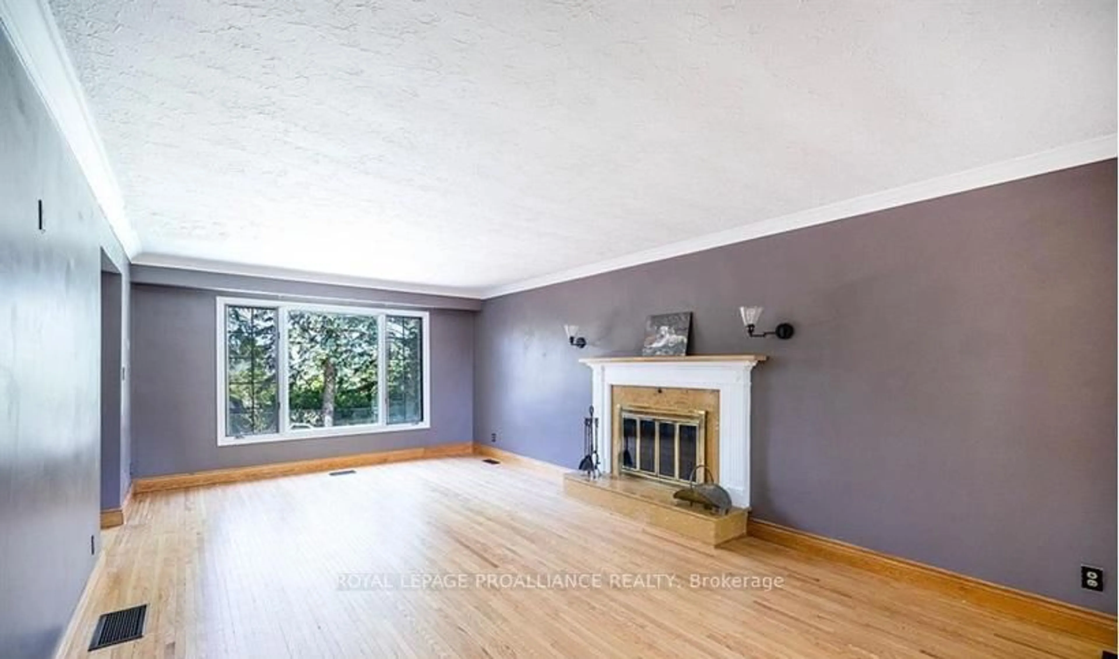 Living room with furniture, wood/laminate floor for 35 Patrick St, Quinte West Ontario K8V 4B4