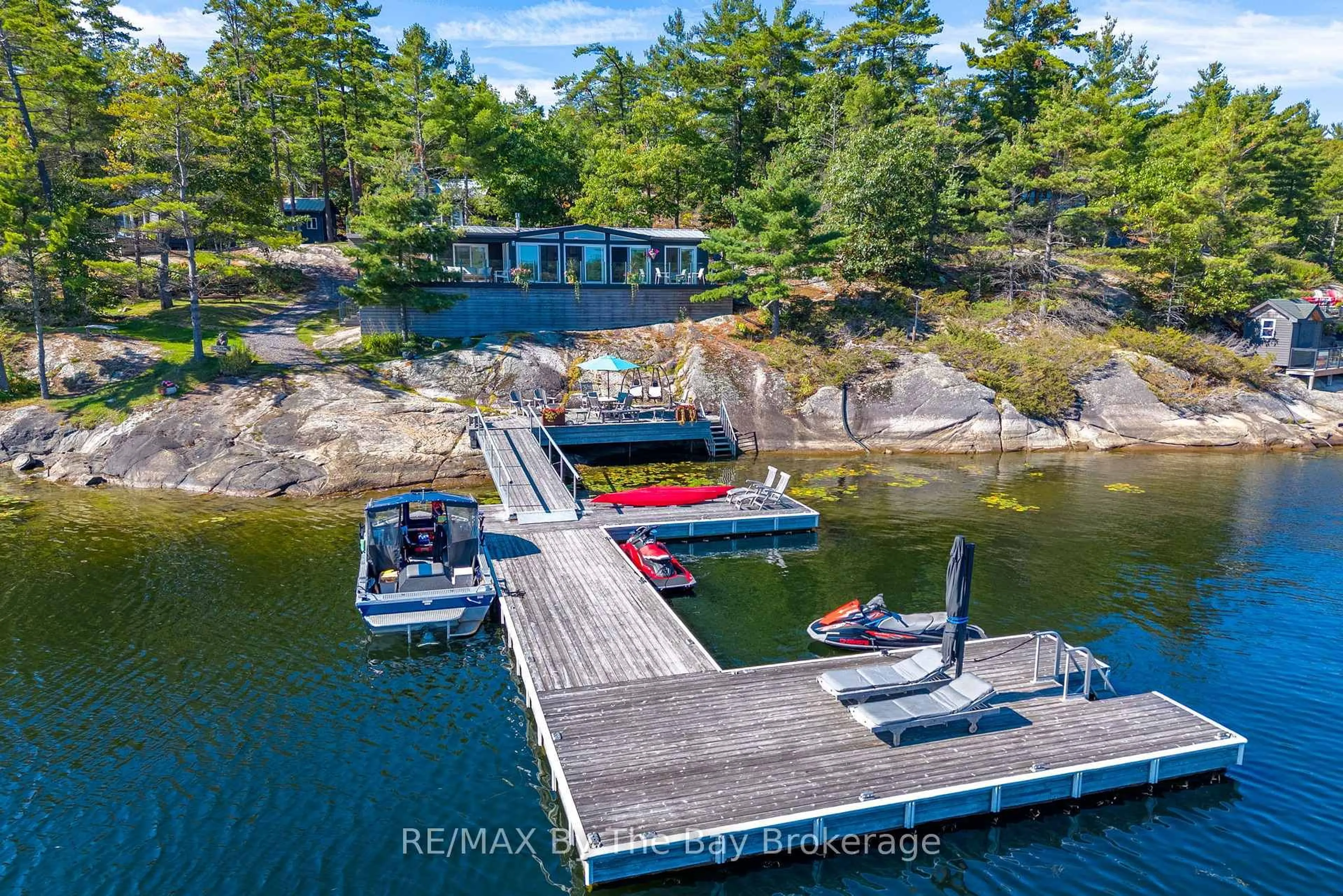 A pic from outside/outdoor area/front of a property/back of a property/a pic from drone, water/lake/river/ocean view for 18152 Georgian Bay Shore, Georgian Bay Ontario P0E 1E0