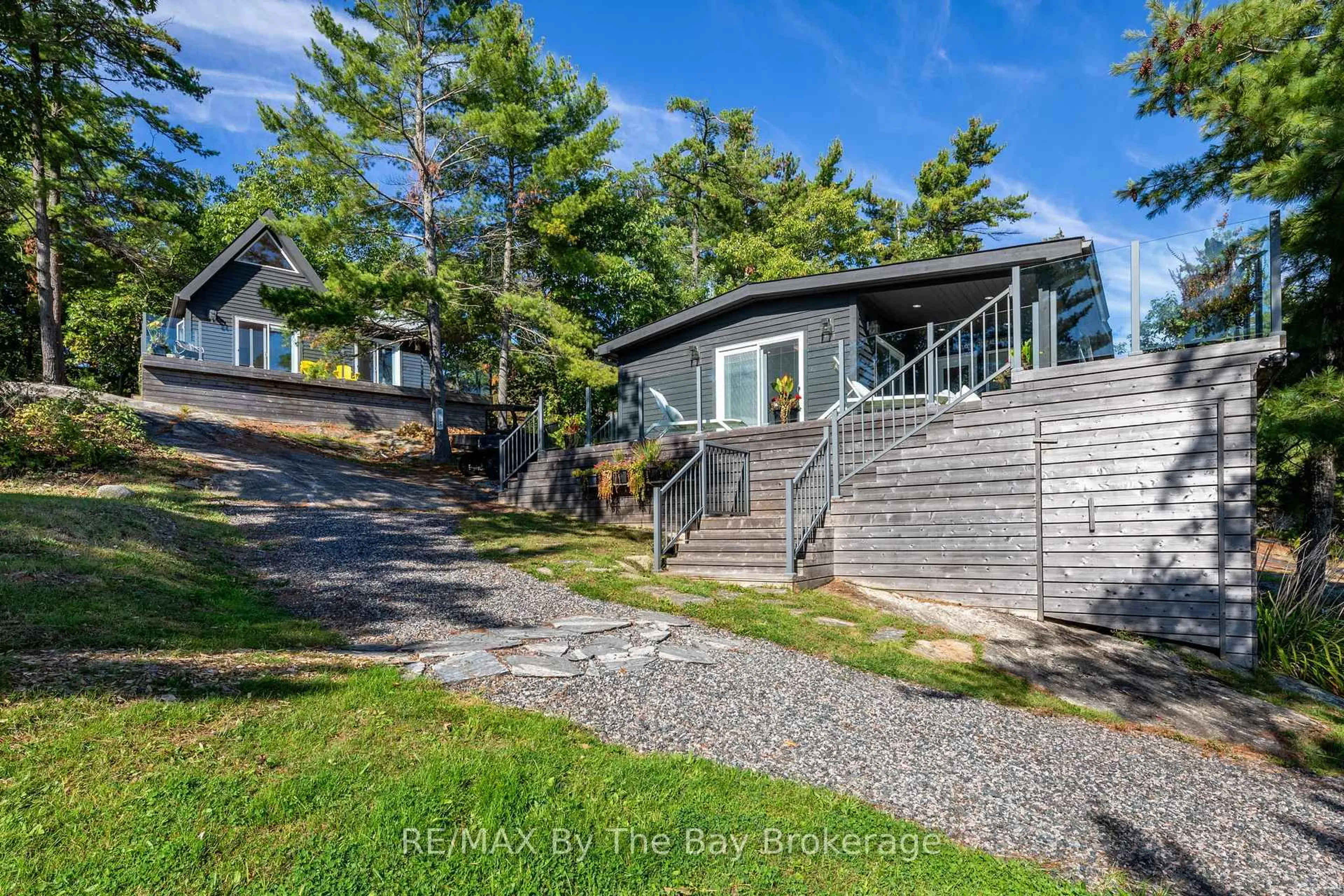 A pic from outside/outdoor area/front of a property/back of a property/a pic from drone, water/lake/river/ocean view for 18152 Georgian Bay Shore, Georgian Bay Ontario P0E 1E0