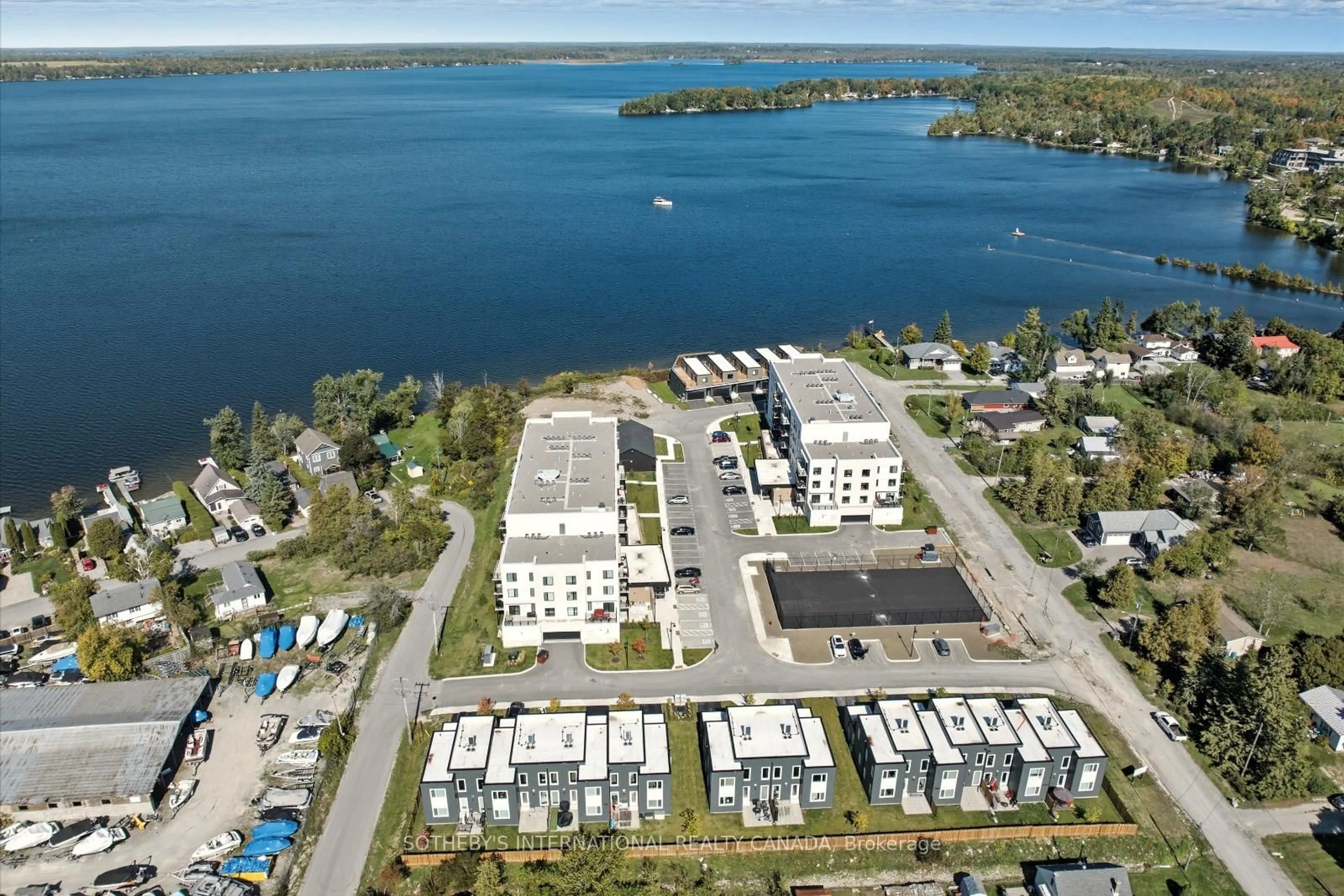 A pic from outside/outdoor area/front of a property/back of a property/a pic from drone, water/lake/river/ocean view for 19 West St N St #17, Kawartha Lakes Ontario K0M 1N0