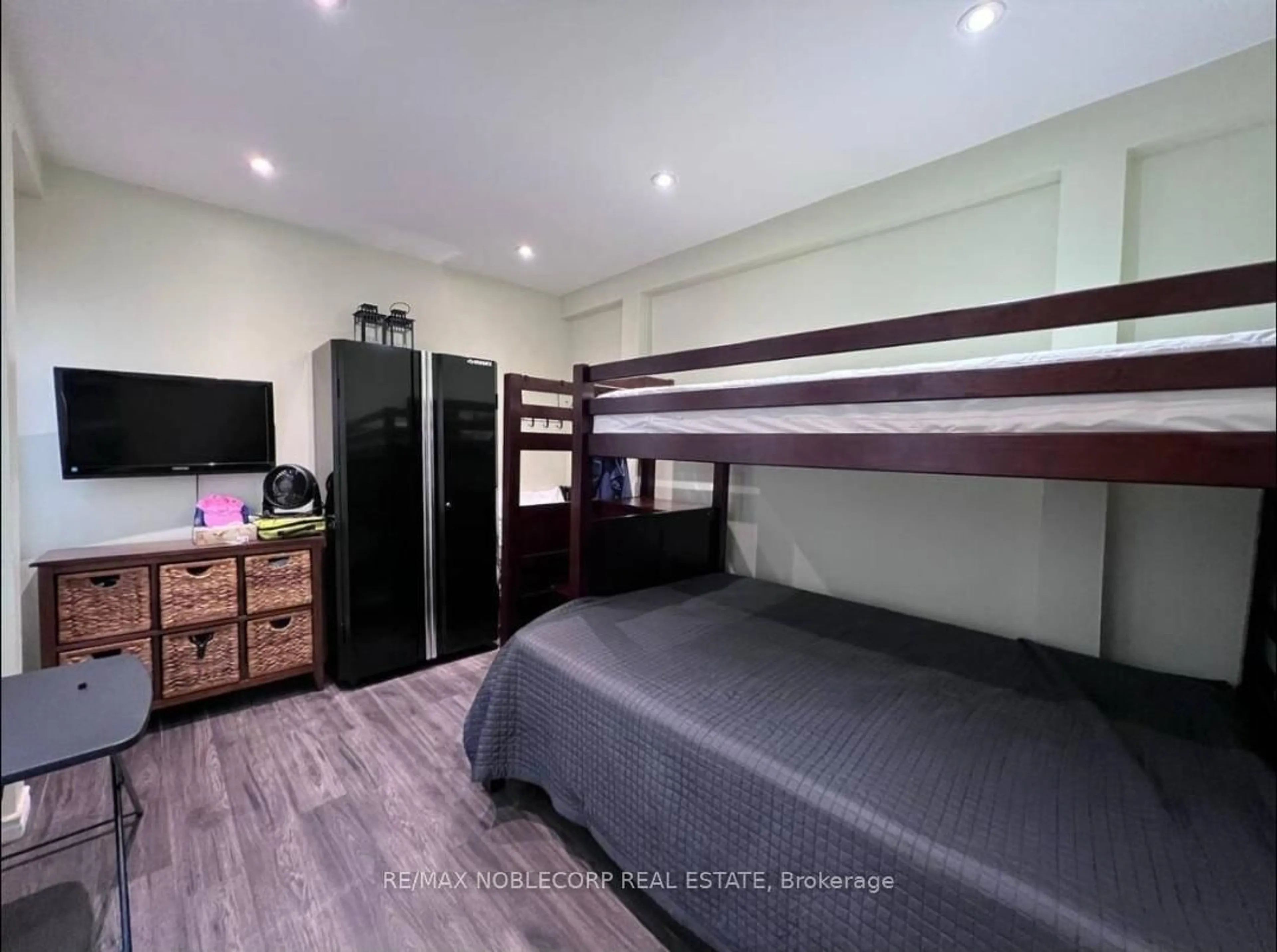 Bedroom with bed, wood/laminate floor for 248 Pinnacle Hill Rd #UNIT 154, Alnwick/Haldimand Ontario K0K 1M0