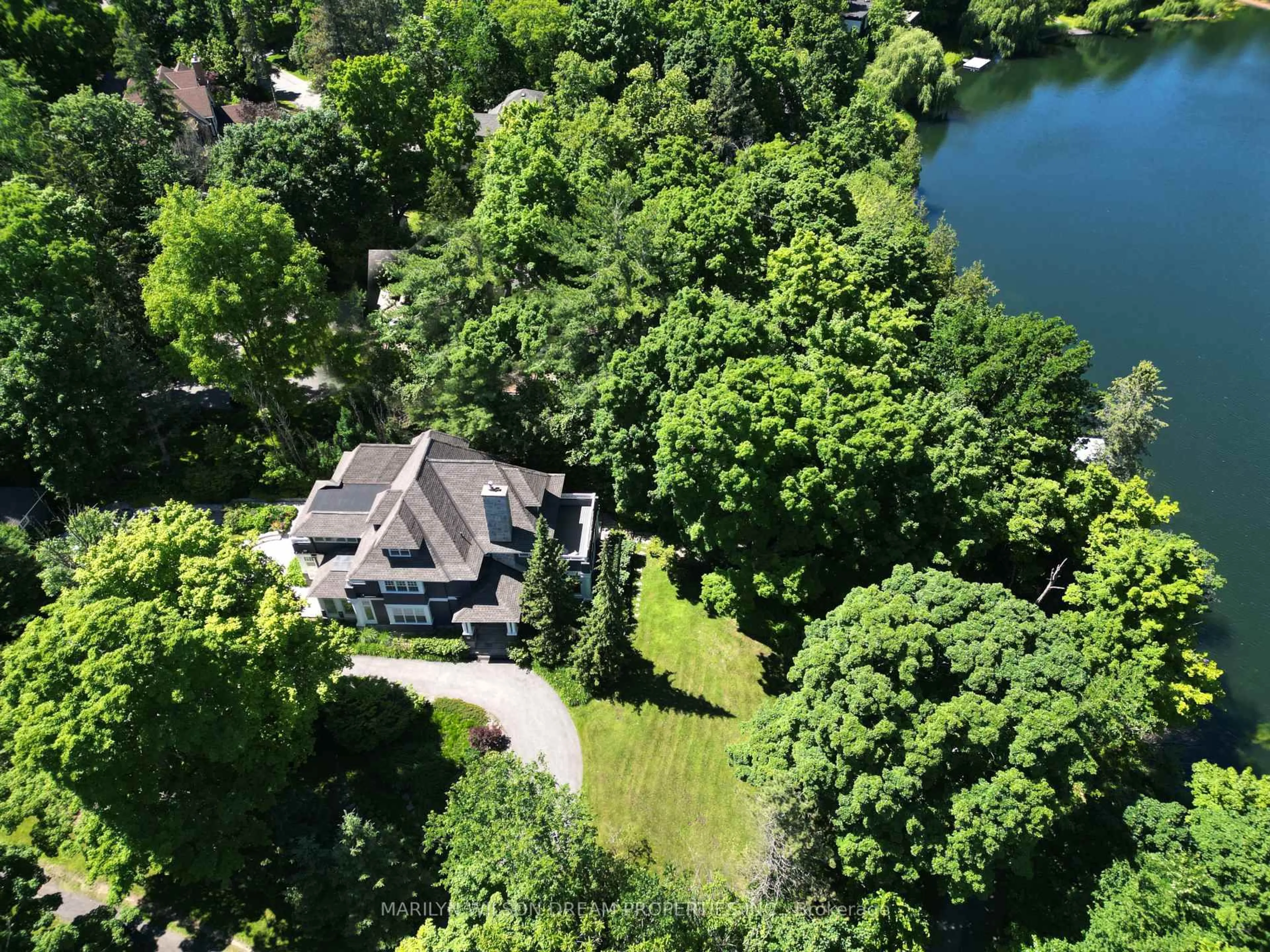 A pic from outside/outdoor area/front of a property/back of a property/a pic from drone, water/lake/river/ocean view for 597 Mariposa Ave, Ottawa Ontario K1M 0S3