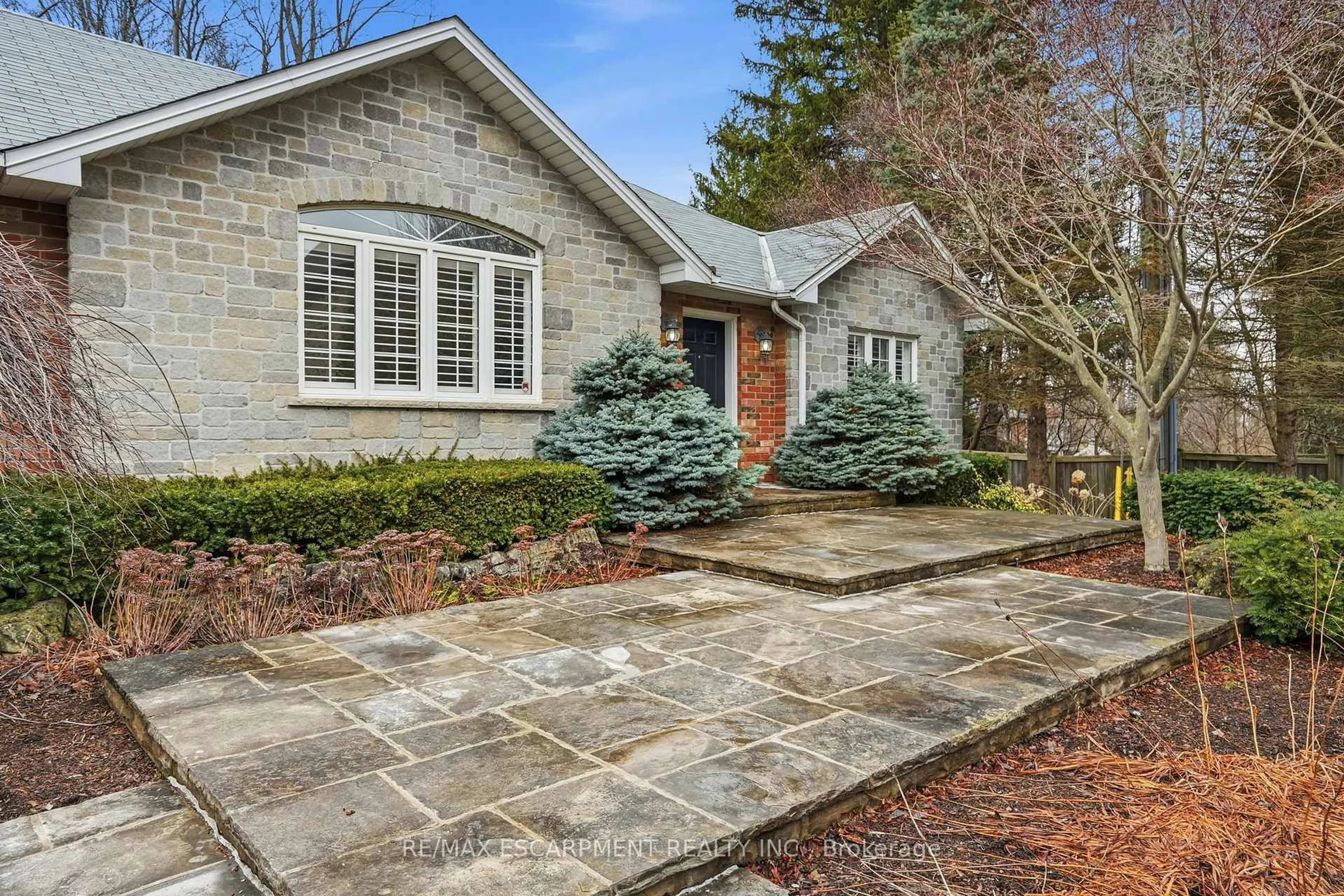 Home with brick exterior material, street for 65 Jerseyville Rd, Hamilton Ontario L9G 1K2