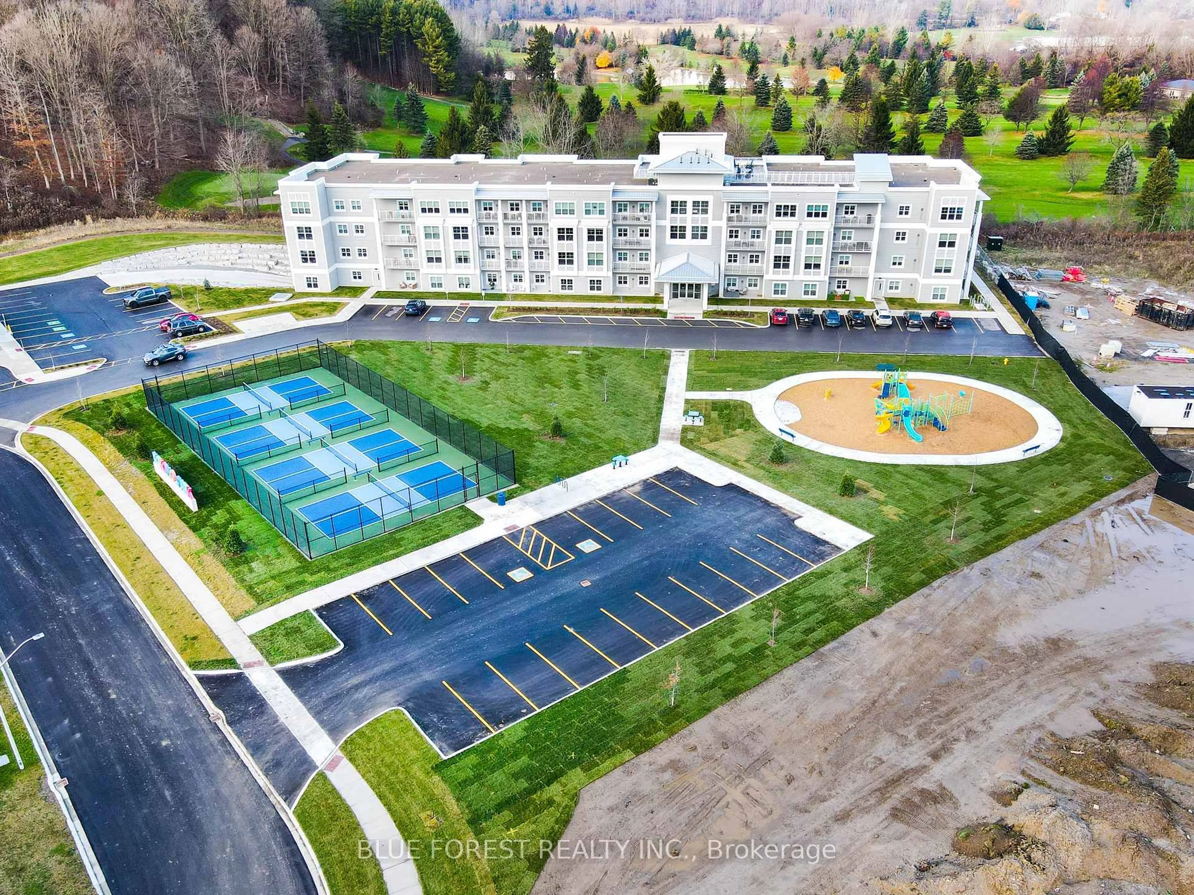 A pic from outside/outdoor area/front of a property/back of a property/a pic from drone, mountain view for 100 THE PROMENADE #307, Central Elgin Ontario N5L 1C5