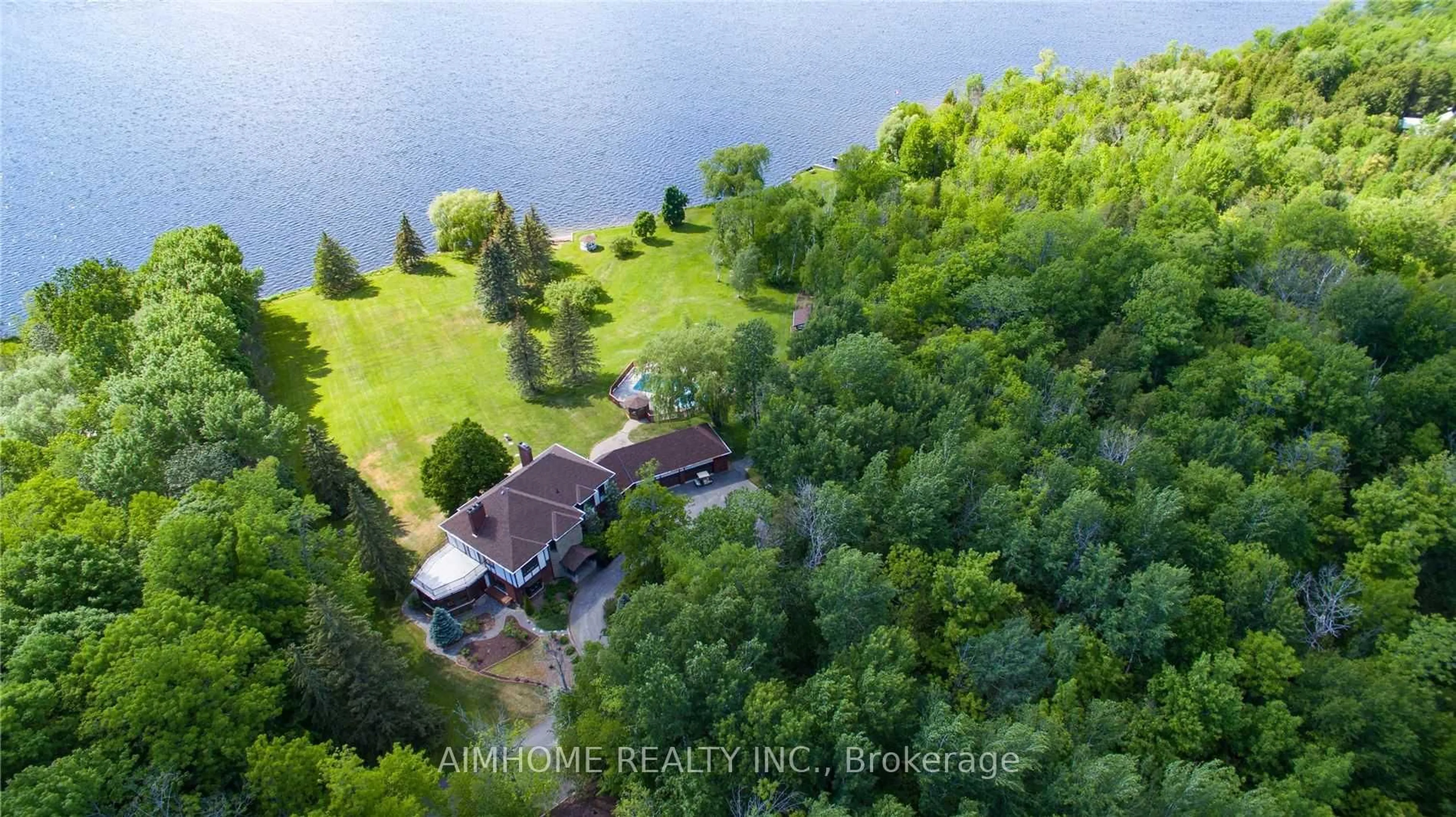 A pic from outside/outdoor area/front of a property/back of a property/a pic from drone, water/lake/river/ocean view for 1515 HAWKSWOOD Dr, Selwyn Ontario K0L 1T0