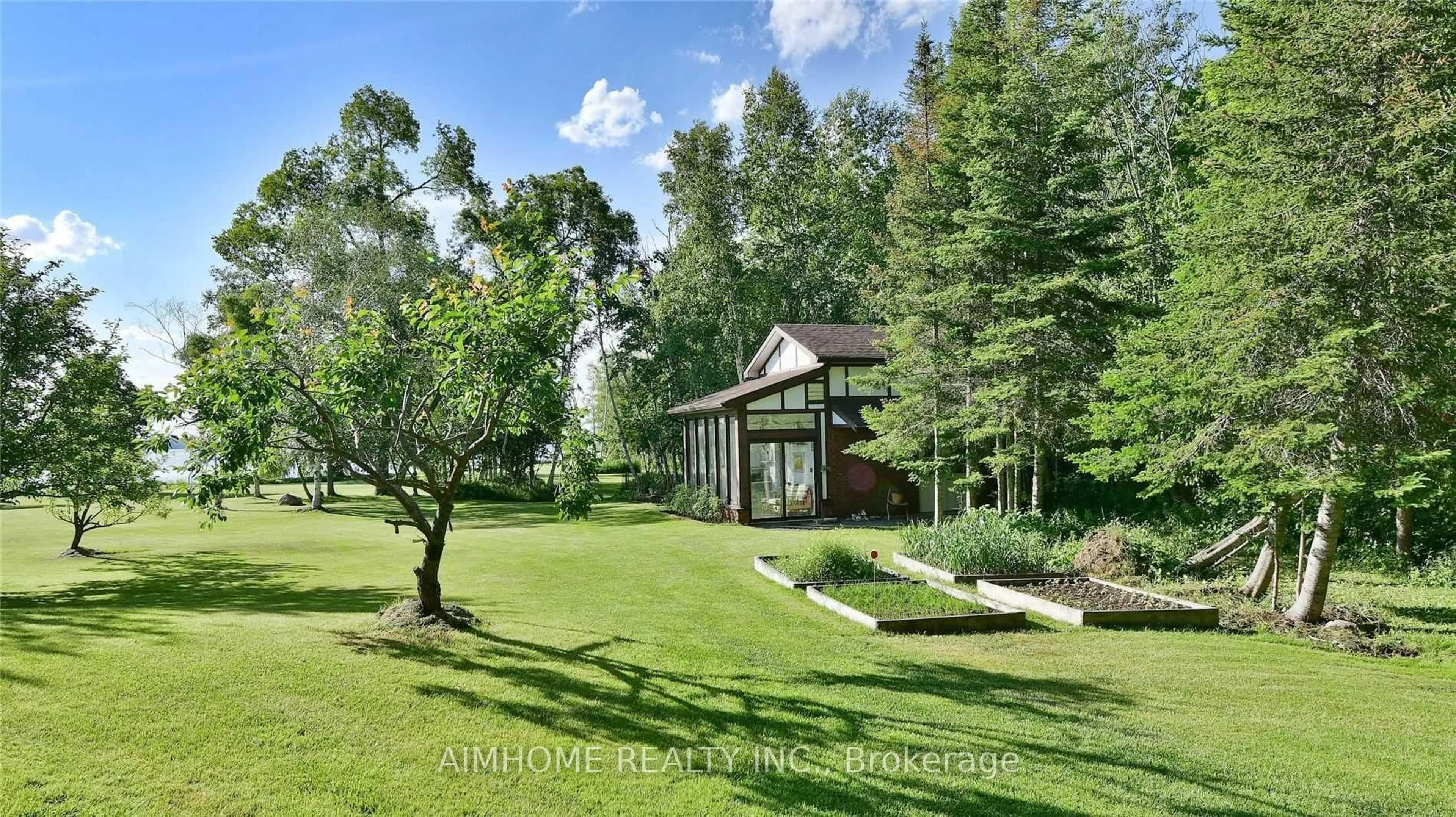 A pic from outside/outdoor area/front of a property/back of a property/a pic from drone, forest/trees view for 1515 HAWKSWOOD Dr, Selwyn Ontario K0L 1T0