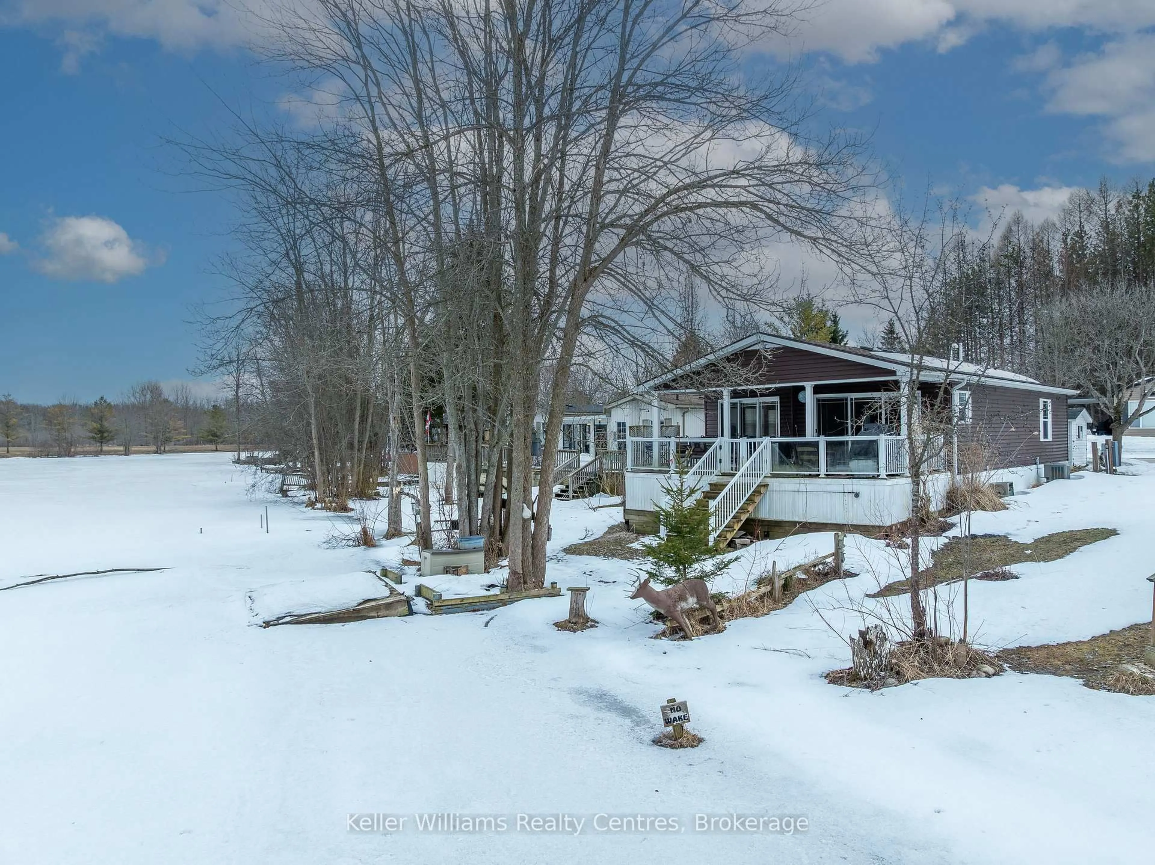 A pic from outside/outdoor area/front of a property/back of a property/a pic from drone, water/lake/river/ocean view for 13 Southline Ave #M24, Huron-Kinloss Ontario N2Z 2X5