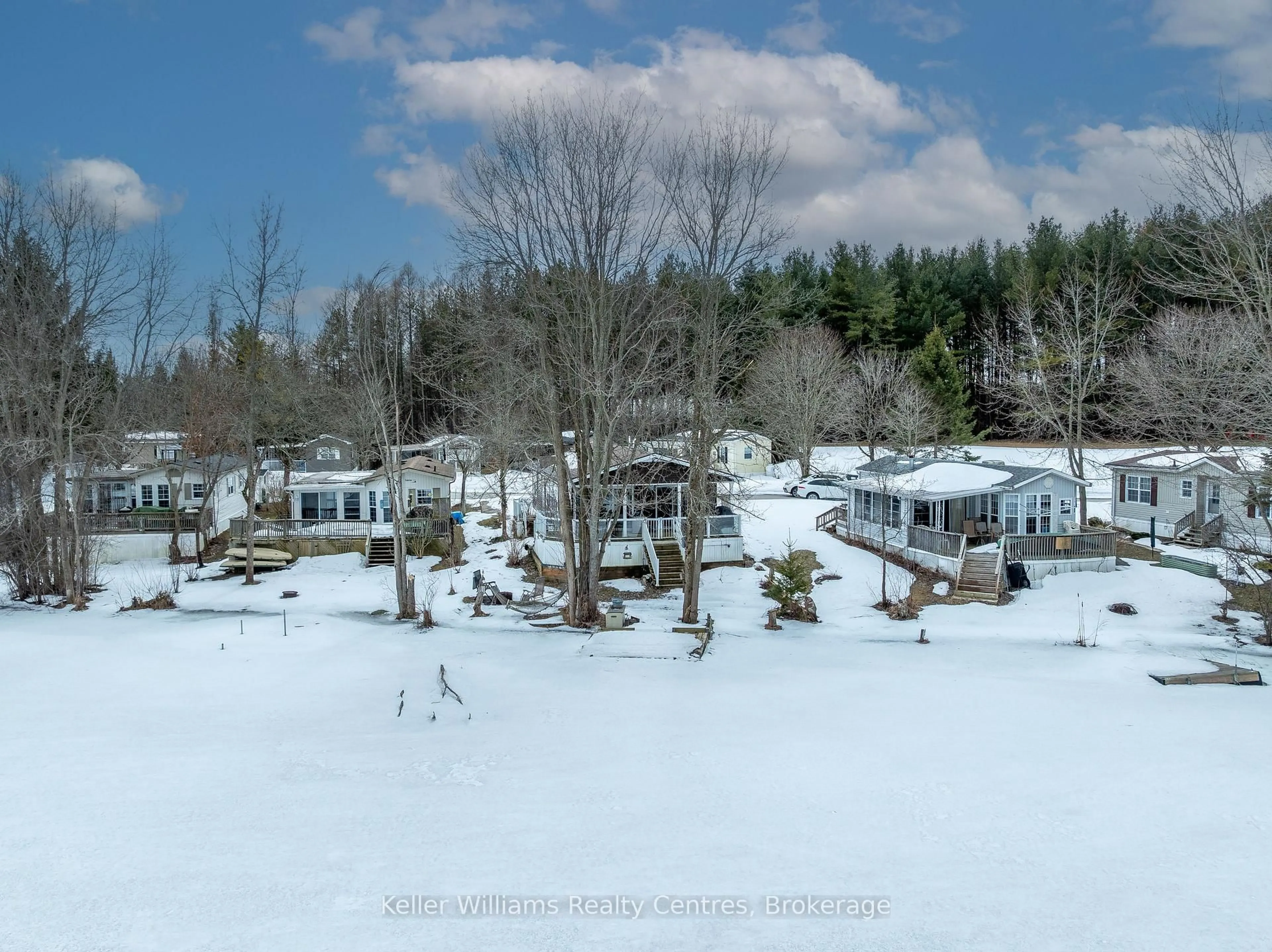 A pic from outside/outdoor area/front of a property/back of a property/a pic from drone, water/lake/river/ocean view for 13 Southline Ave #M24, Huron-Kinloss Ontario N2Z 2X5