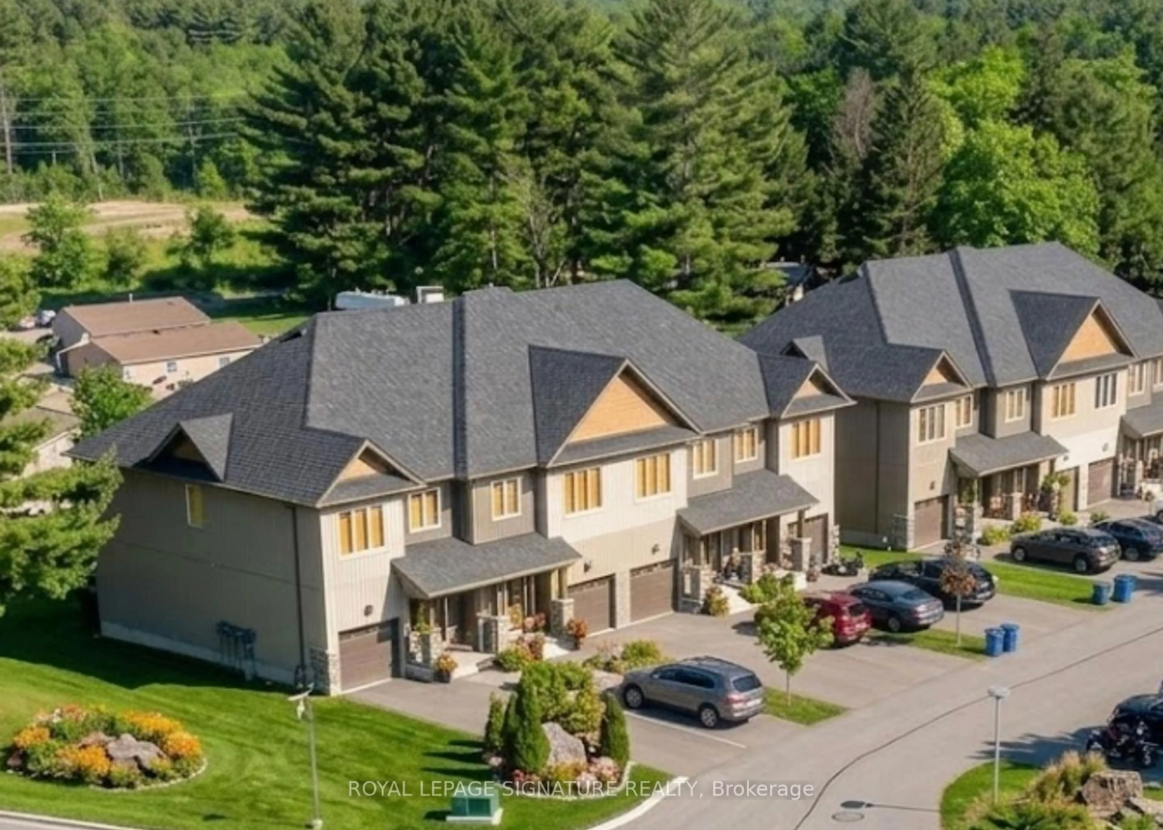 A pic from outside/outdoor area/front of a property/back of a property/a pic from drone, mountain view for 393 Manitoba St #8, Bracebridge Ontario P1L 1B4