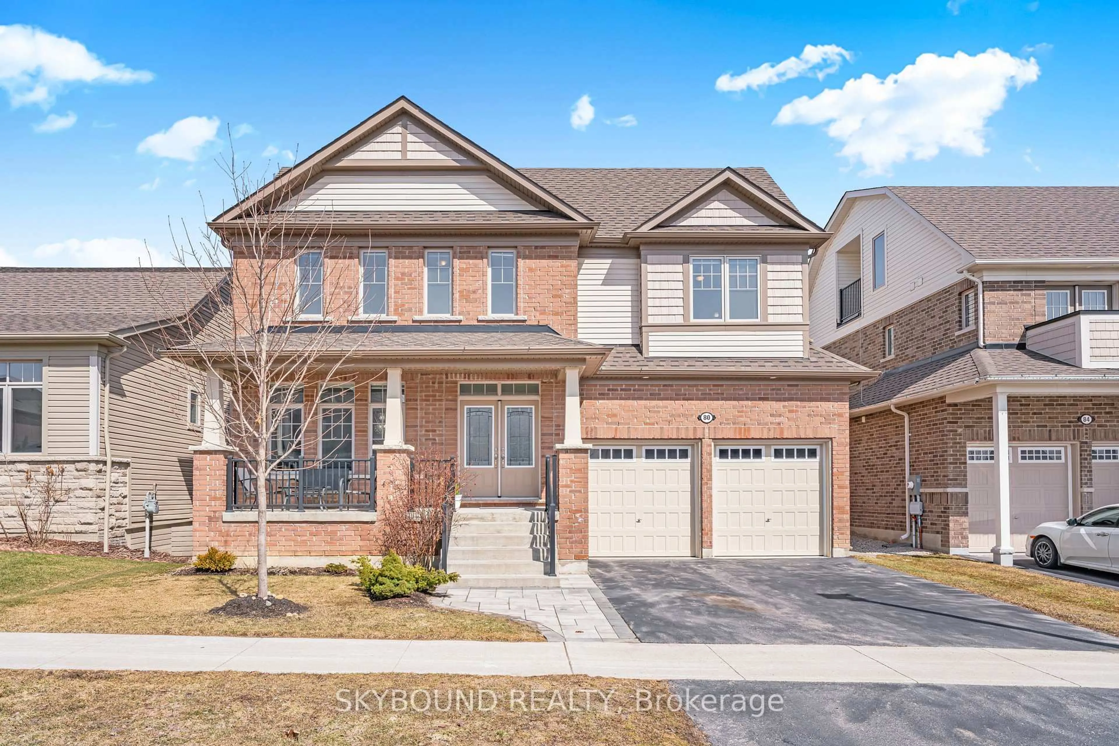 Home with brick exterior material, street for 80 Harpin Way, Centre Wellington Ontario N1M 0H1