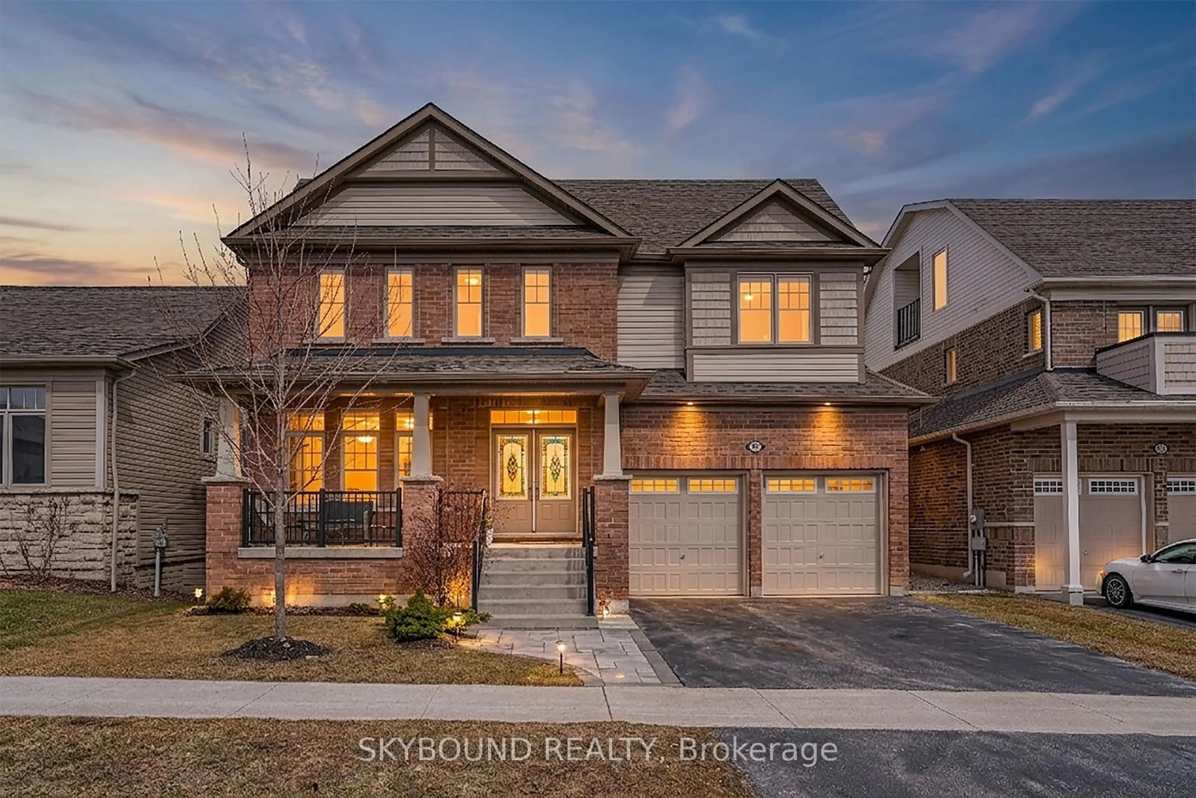 Home with brick exterior material, street for 80 Harpin Way, Centre Wellington Ontario N1M 0H1