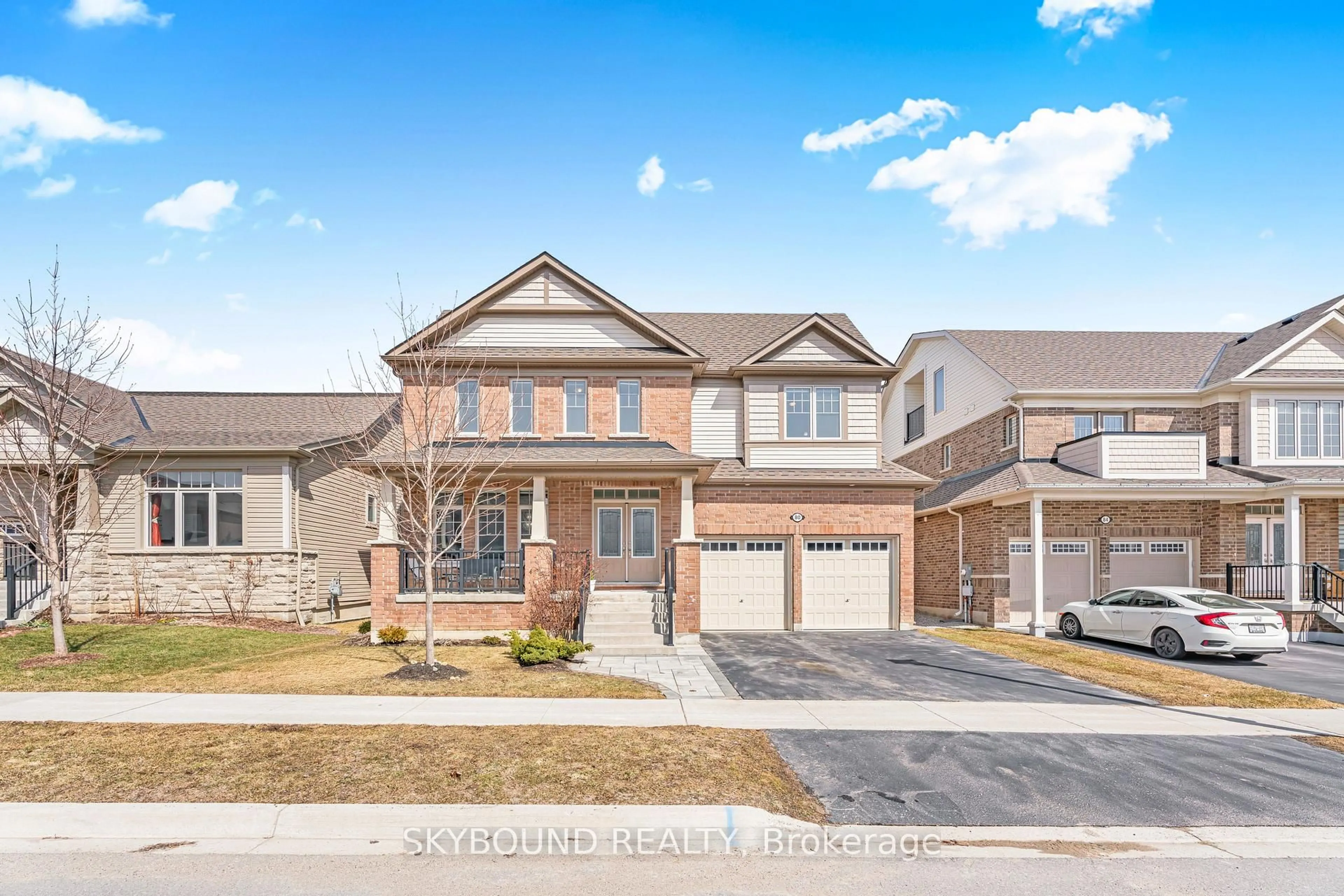 Home with brick exterior material, street for 80 Harpin Way, Centre Wellington Ontario N1M 0H1
