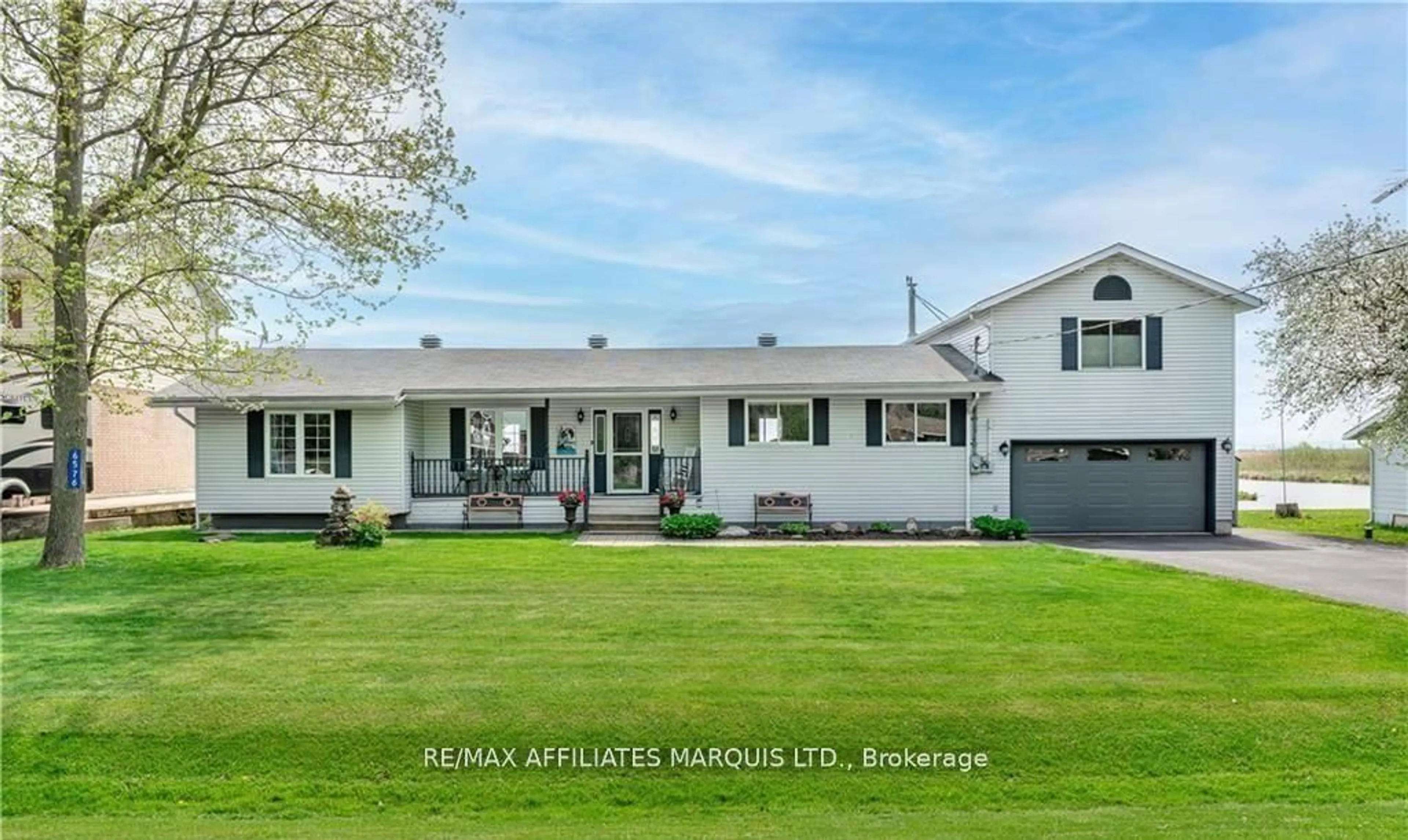 Home with vinyl exterior material, street for 6576 Tree Haven Rd, South Glengarry Ontario K0C 2E0