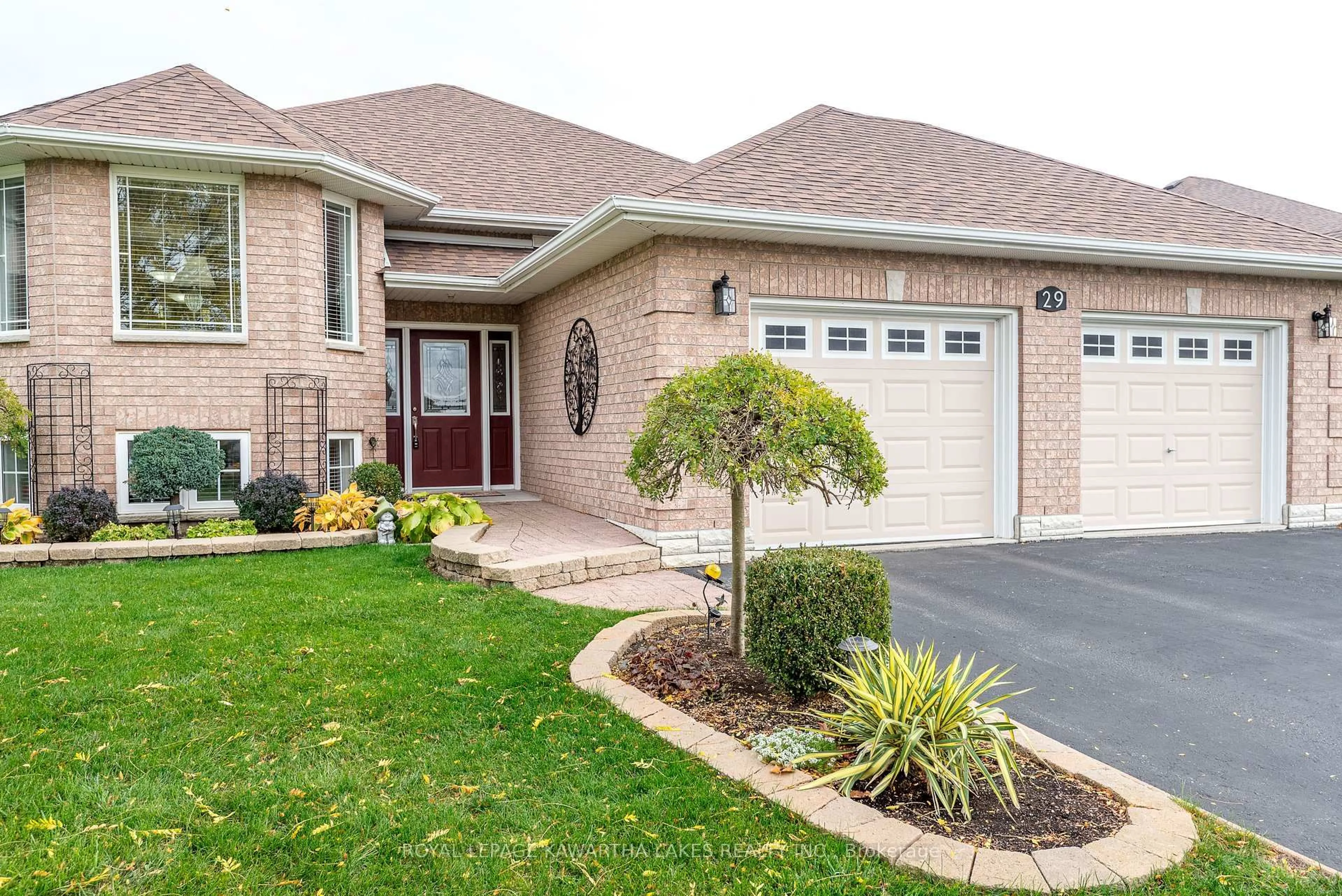 Home with brick exterior material, street for 29 Midland Dr, Kawartha Lakes Ontario K9V 6B9