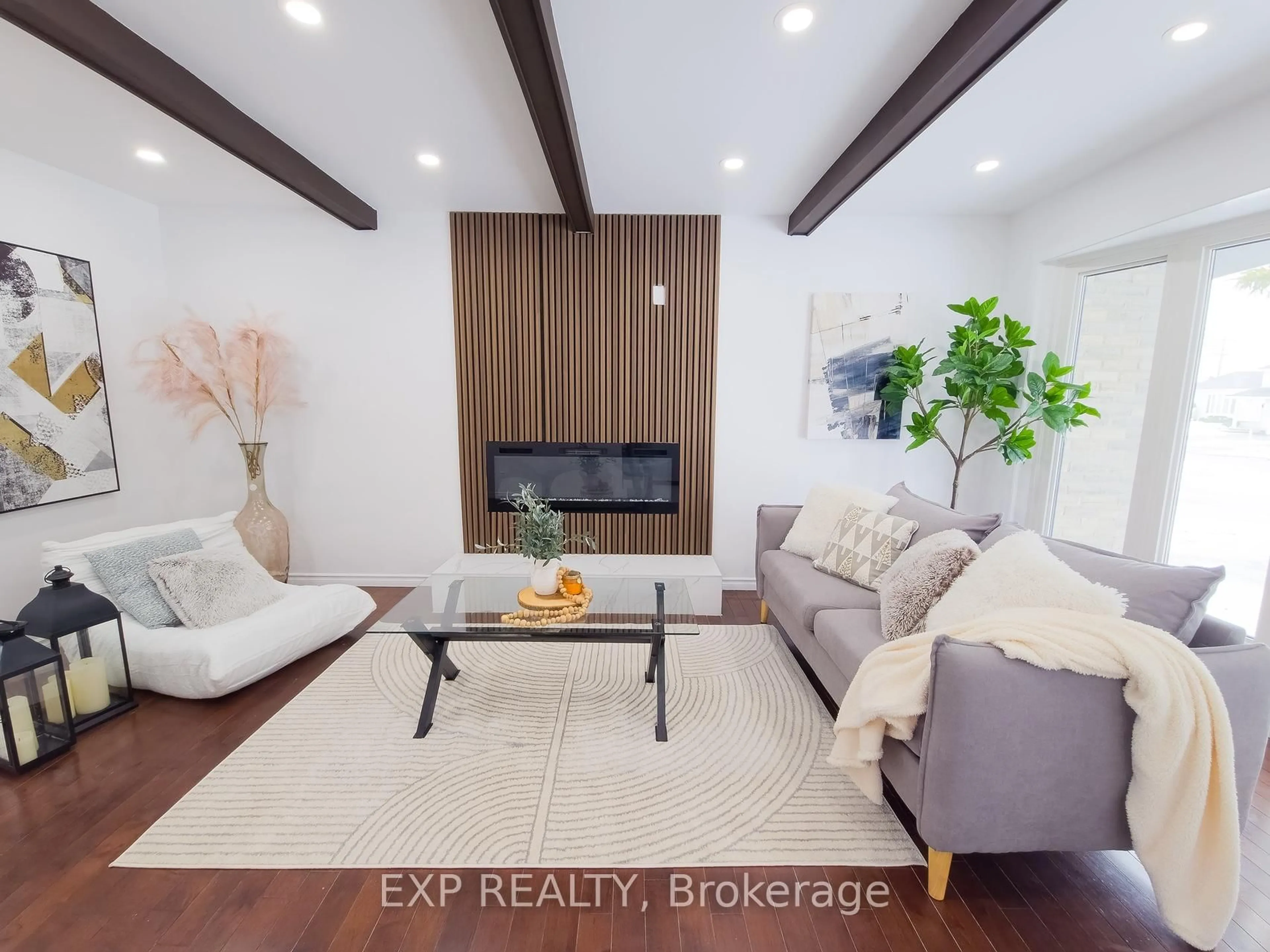 Living room with furniture, wood/laminate floor for 59 Bearbrook Rd, Ottawa Ontario K1B 3H4