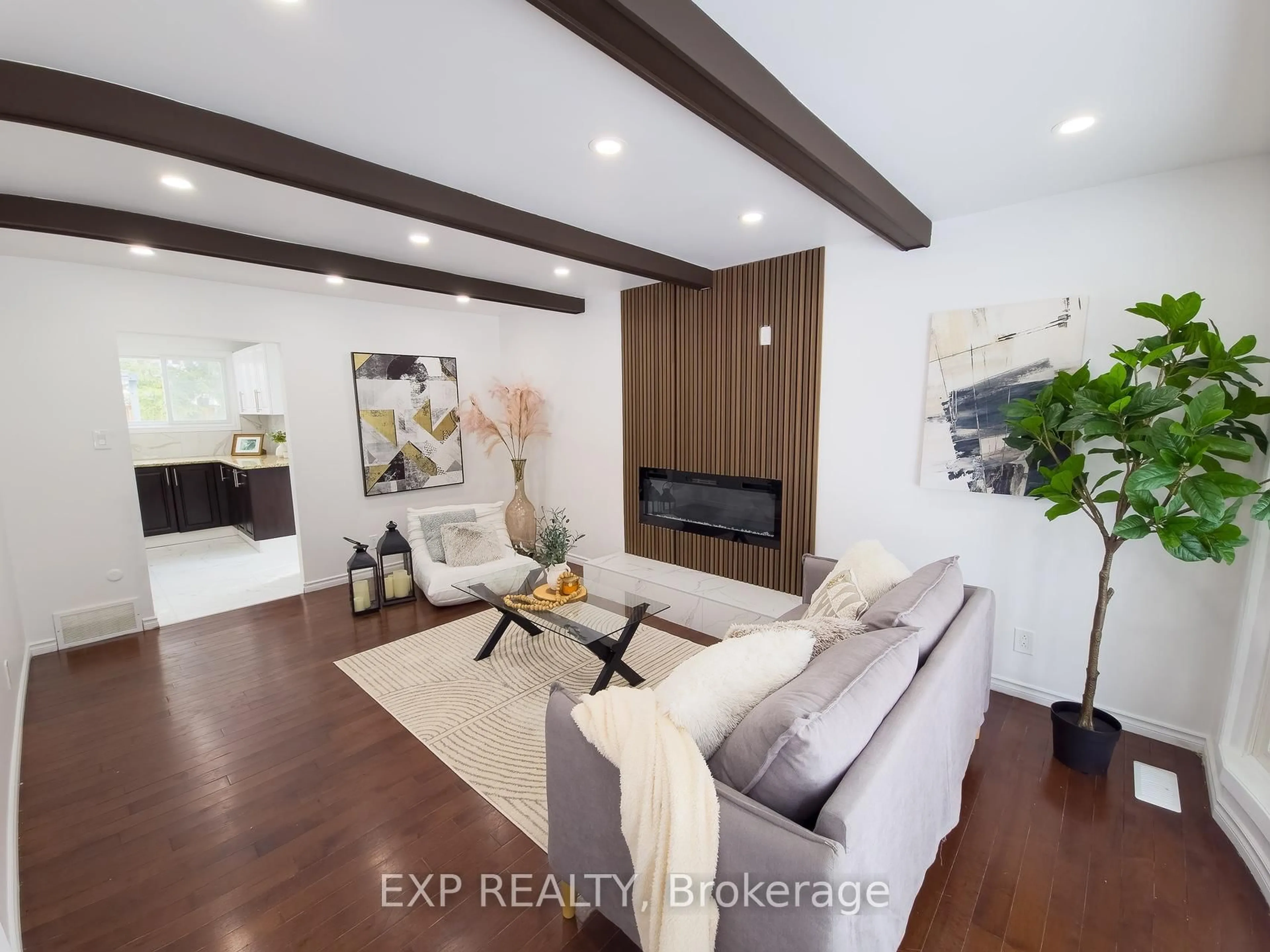 Living room with furniture, wood/laminate floor for 59 Bearbrook Rd, Ottawa Ontario K1B 3H4