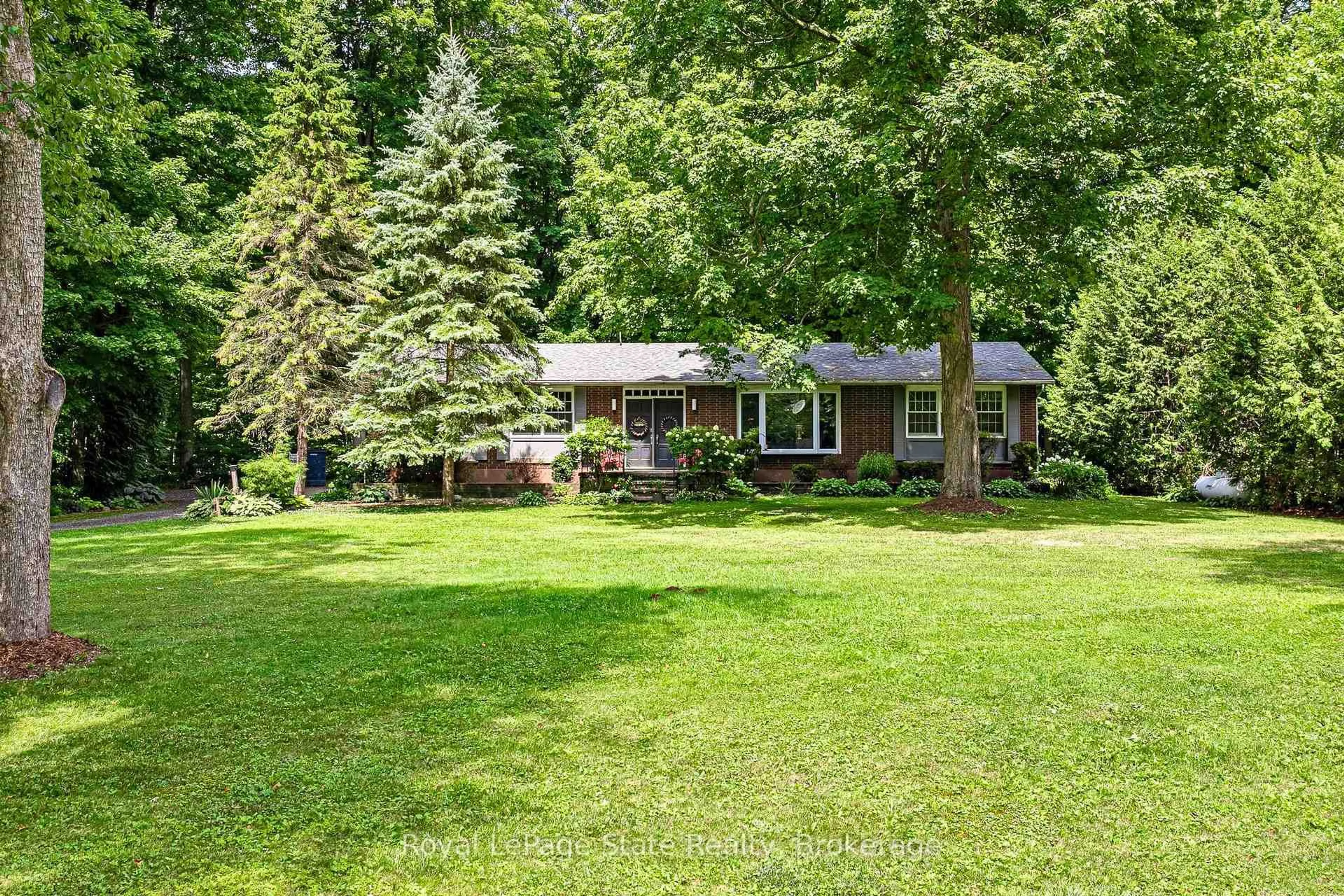 A pic from outside/outdoor area/front of a property/back of a property/a pic from drone, unknown for 587 Windham 13 Rd, Norfolk Ontario N4B 2W5