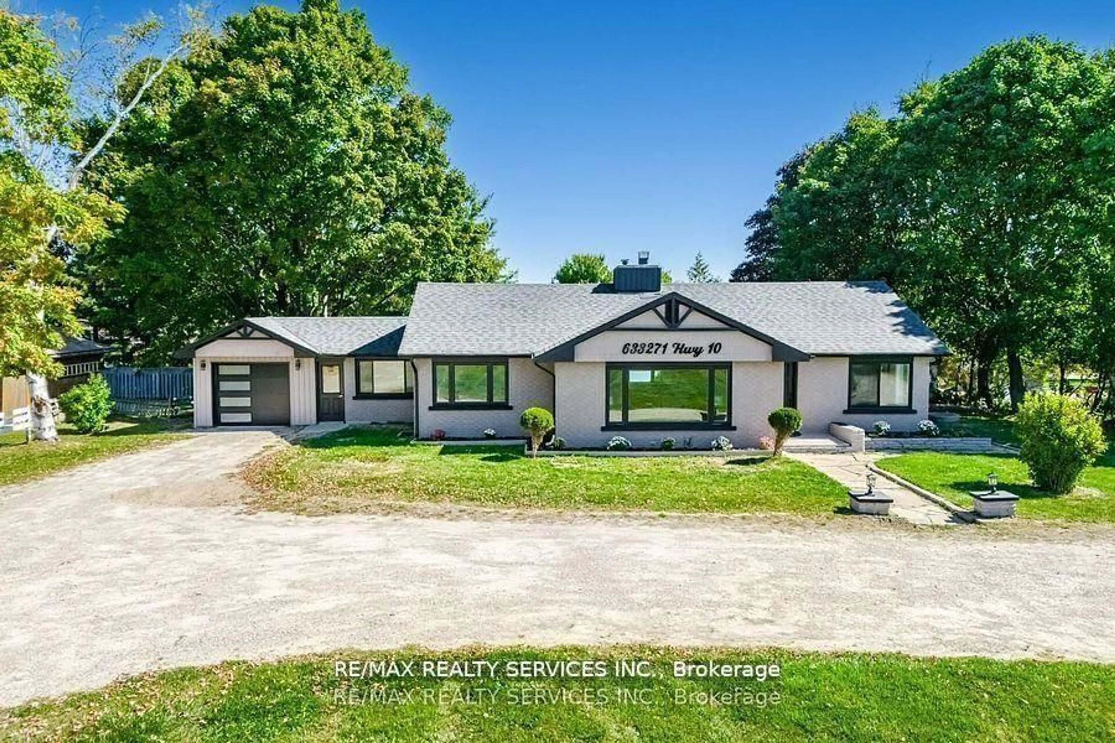 A pic from outside/outdoor area/front of a property/back of a property/a pic from drone, unknown for 633271 Hwy 10, Mono Ontario L9W 5P1