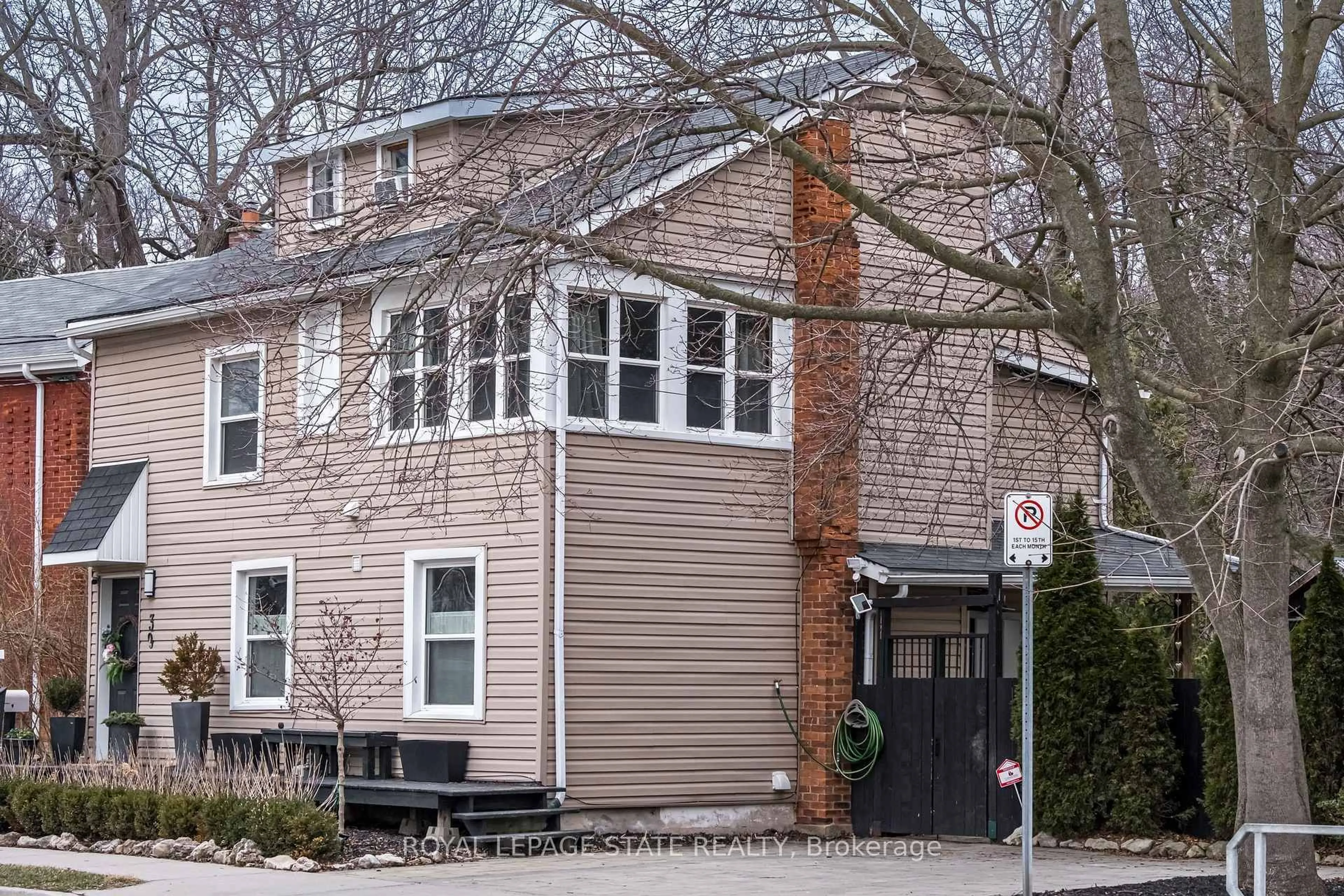 Home with brick exterior material, street for 39 Park St, Hamilton Ontario L9H 1C9