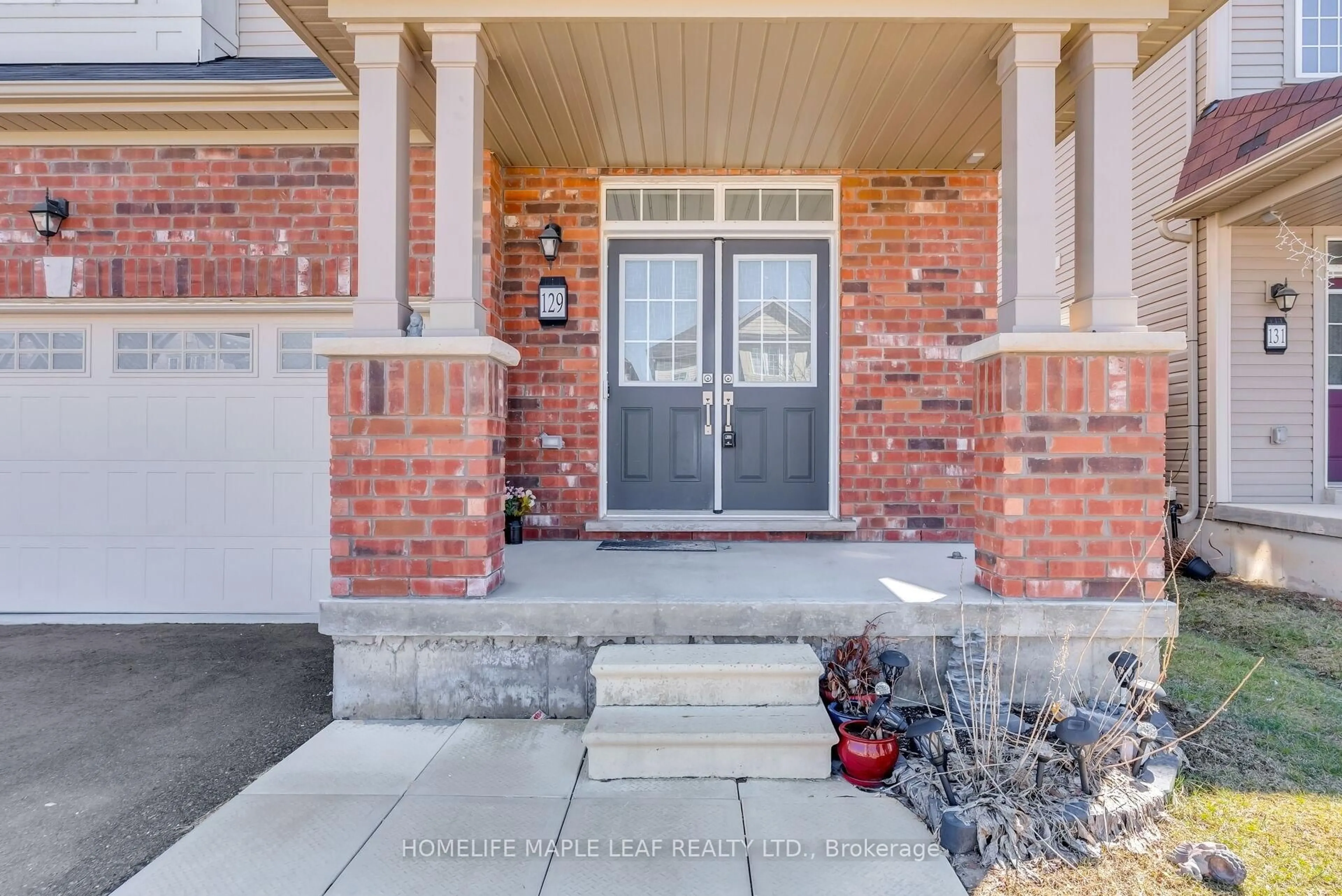 Home with brick exterior material, street for 129 Longboat Ru, Brantford Ontario N3T 0R8