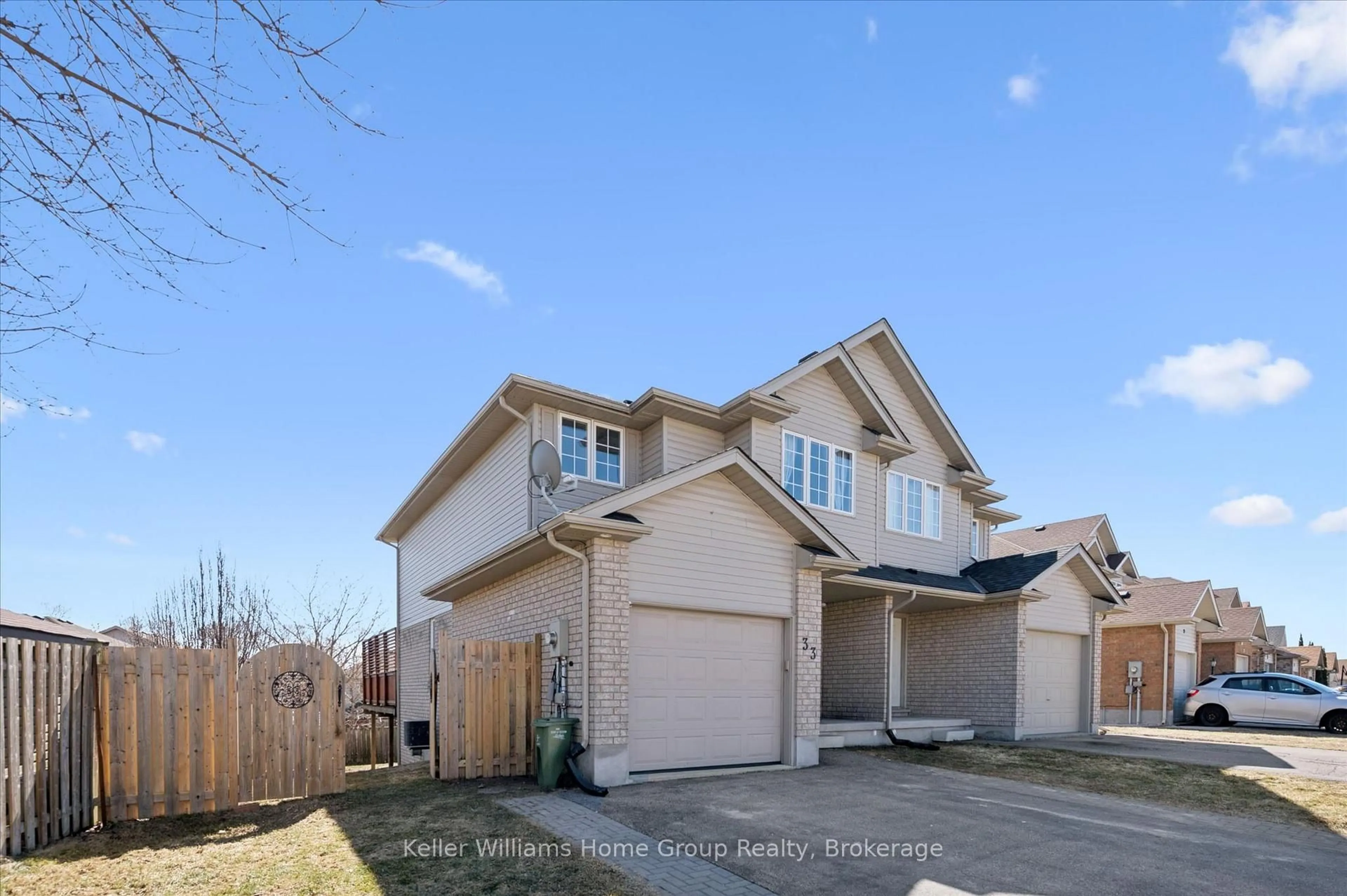 A pic from outside/outdoor area/front of a property/back of a property/a pic from drone, street for 33 Sandcreek Lane, Guelph Ontario N1E 7K9