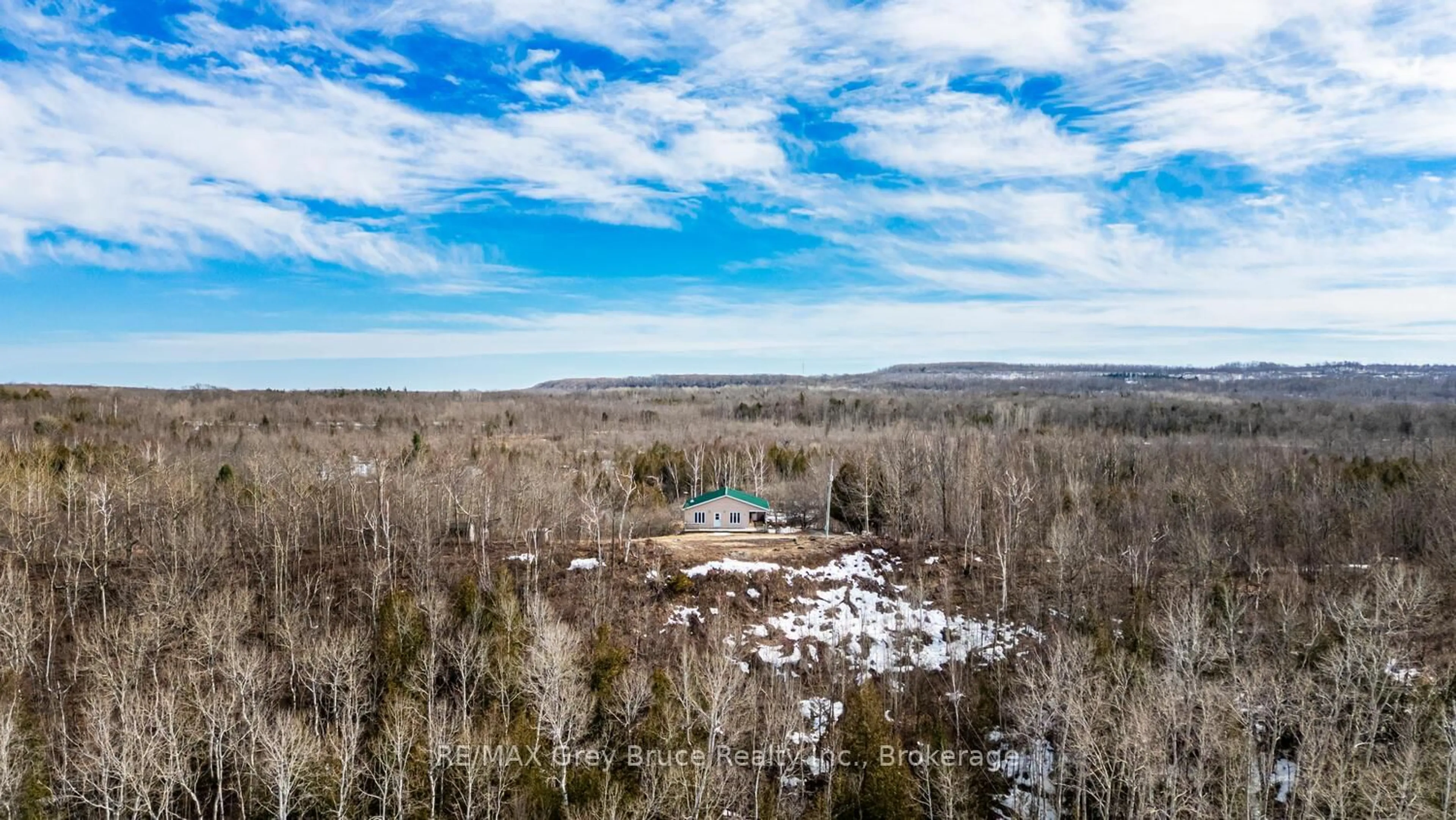 A pic from outside/outdoor area/front of a property/back of a property/a pic from drone, water/lake/river/ocean view for 504240 Grey Road 1 Rd, Georgian Bluffs Ontario N0H 2T0