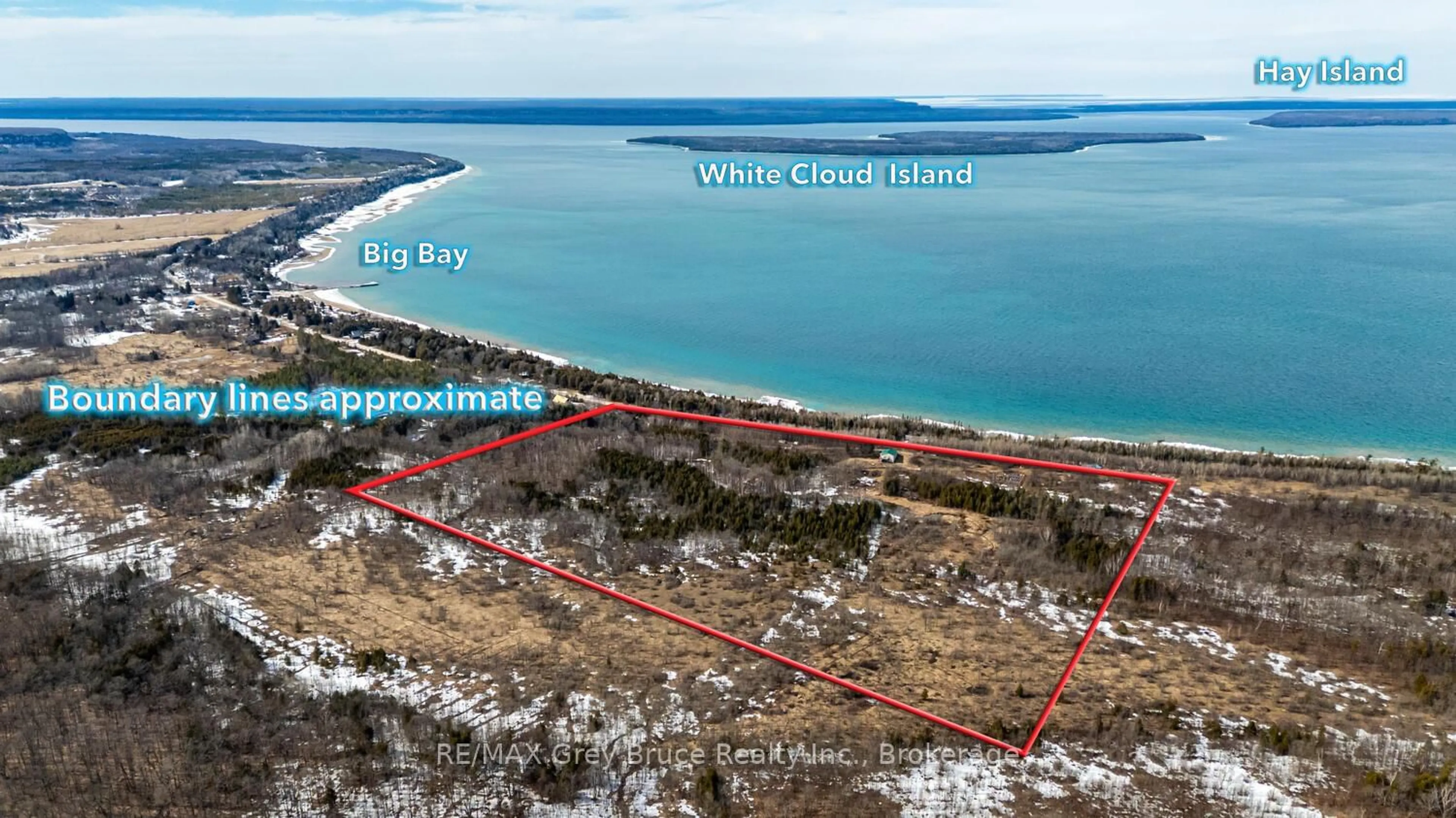 A pic from outside/outdoor area/front of a property/back of a property/a pic from drone, water/lake/river/ocean view for 504240 Grey Road 1 Rd, Georgian Bluffs Ontario N0H 2T0