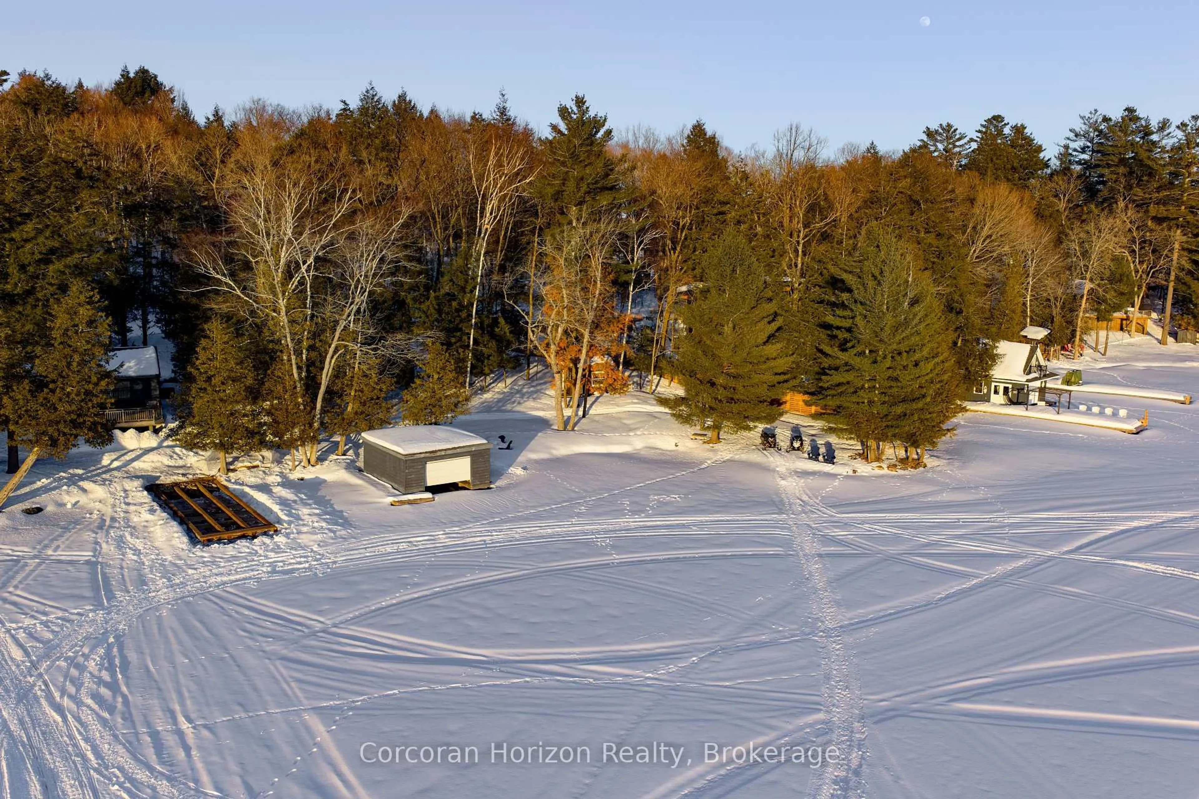 A pic from outside/outdoor area/front of a property/back of a property/a pic from drone, forest/trees view for 1050 Fair-Lee Park Rd, Muskoka Lakes Ontario P0B 1G0