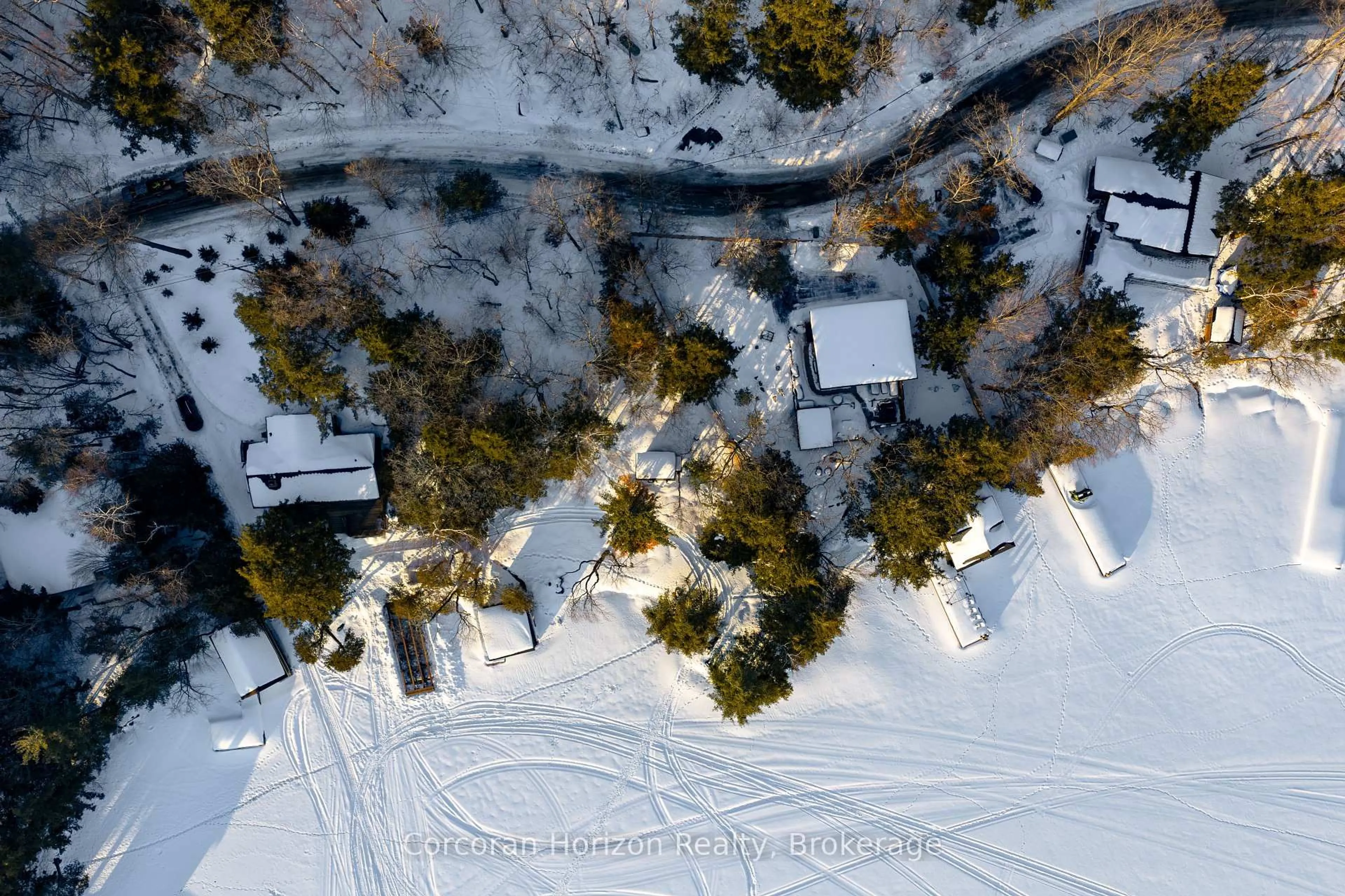 A pic from outside/outdoor area/front of a property/back of a property/a pic from drone, street for 1050 Fair-Lee Park Rd, Muskoka Lakes Ontario P0B 1G0