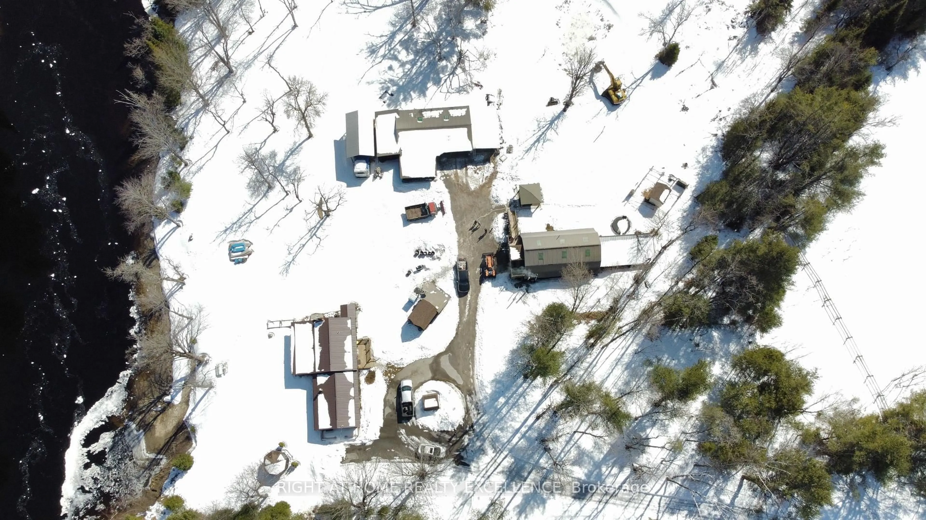 A pic from outside/outdoor area/front of a property/back of a property/a pic from drone, street for 1246 Howland Junction Rd, Minden Hills Ontario K0M 2A1