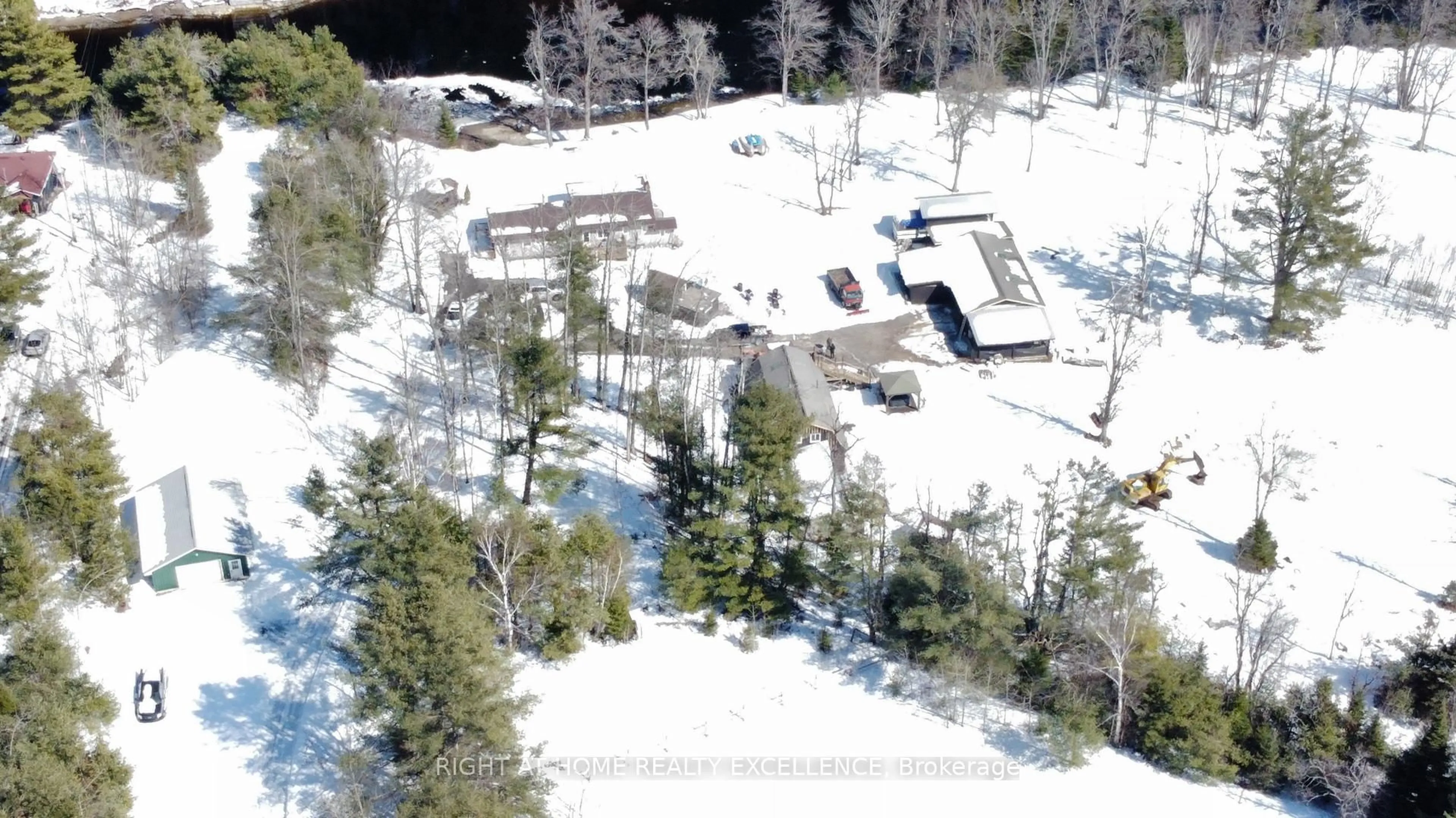 A pic from outside/outdoor area/front of a property/back of a property/a pic from drone, mountain view for 1246 Howland Junction Rd, Minden Hills Ontario K0M 2A1