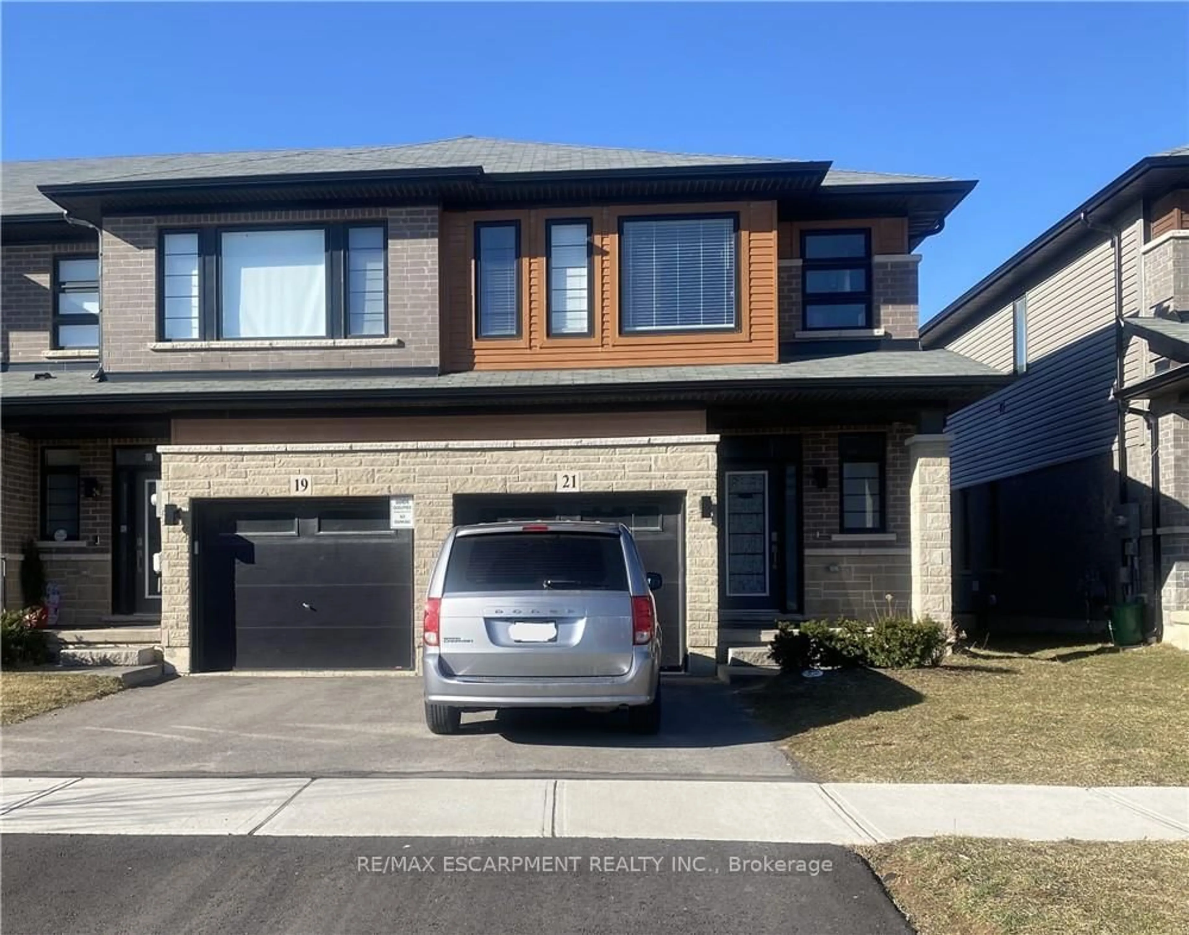 Home with brick exterior material, street for 21 June Callwood Way, Brantford Ontario N3T 0V1