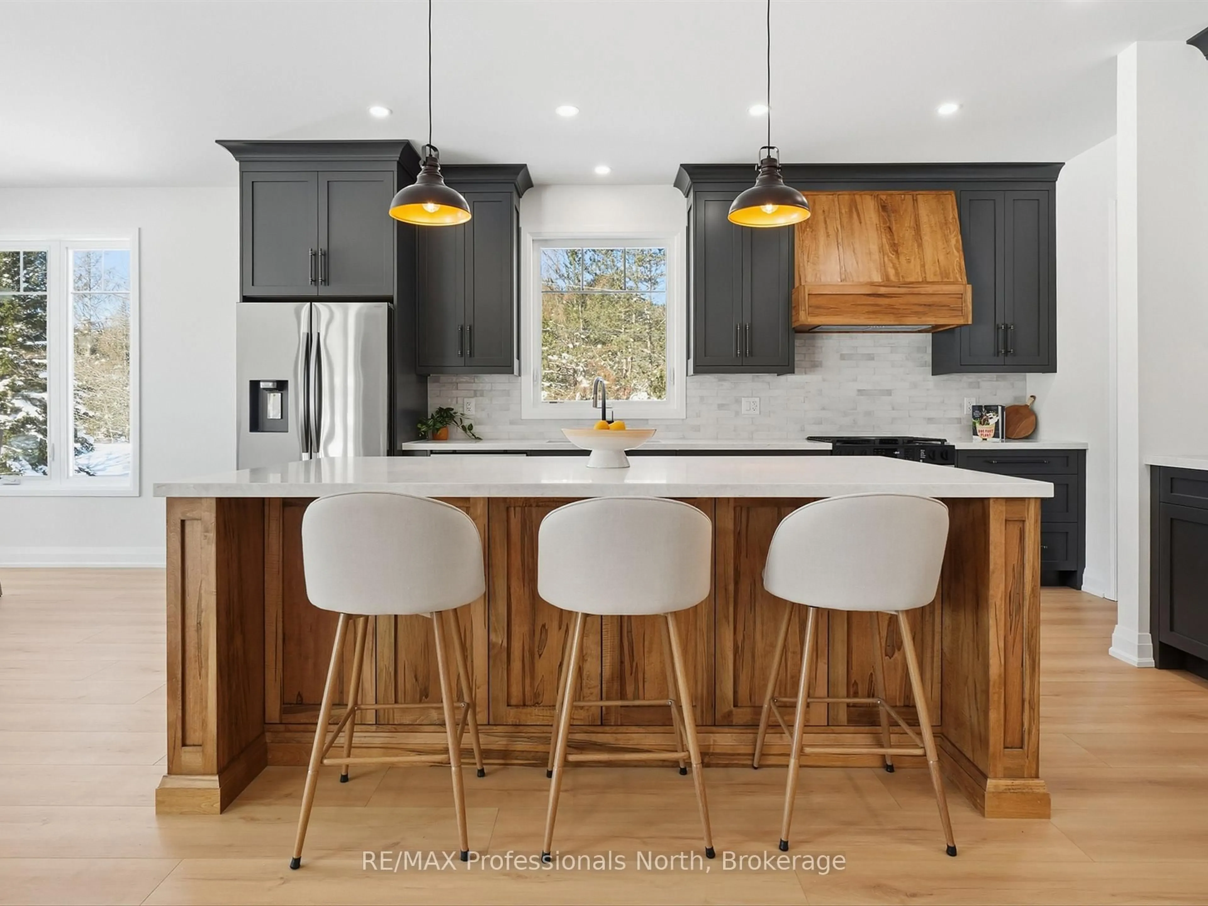 Contemporary kitchen, wood/laminate floor for 11 Clarkes Lane, Huntsville Ontario P0B 1M0