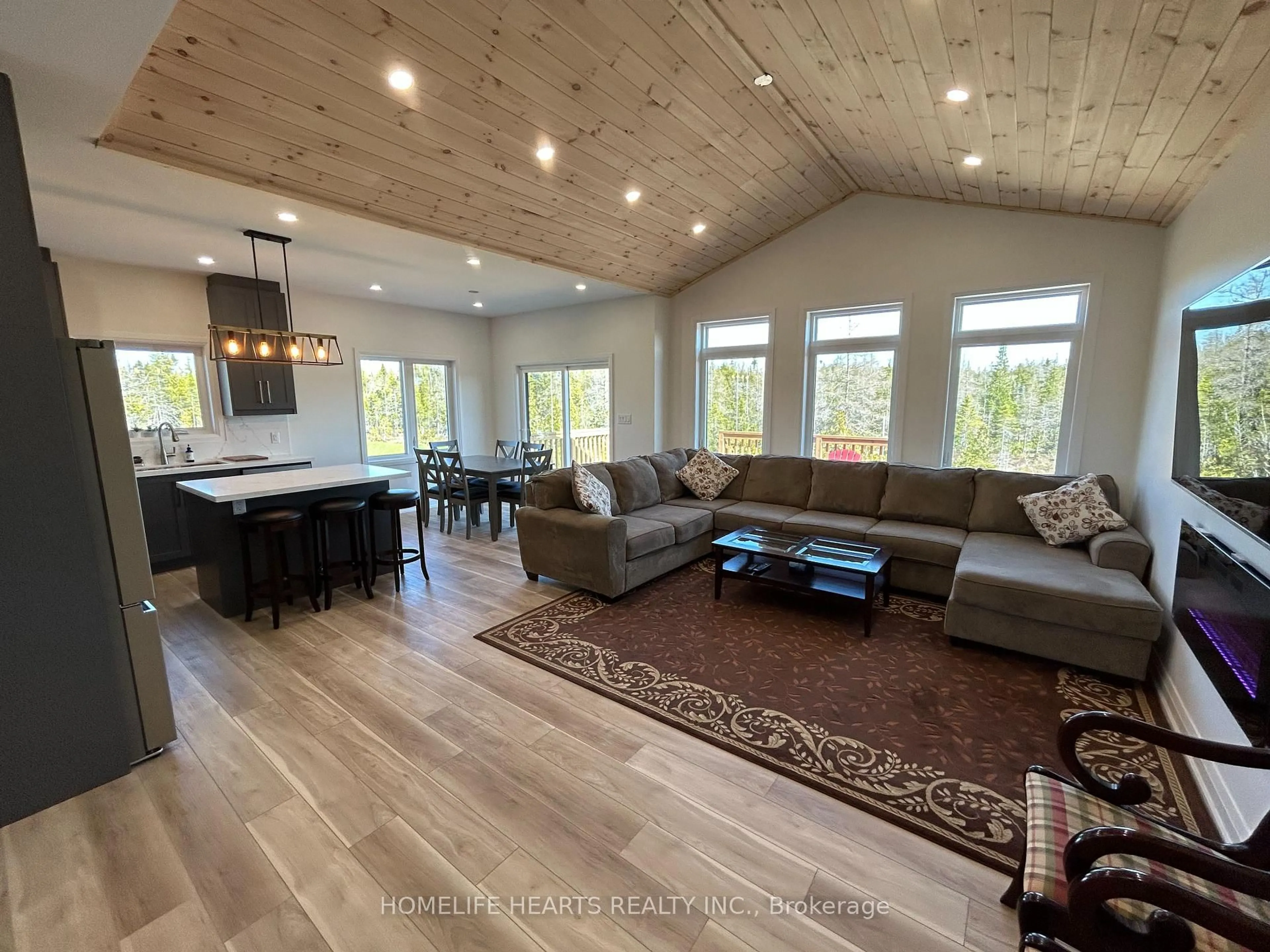 Living room with furniture, wood/laminate floor for 629 Lindsay Rd #30, Northern Bruce Peninsula Ontario N0H 1Z0