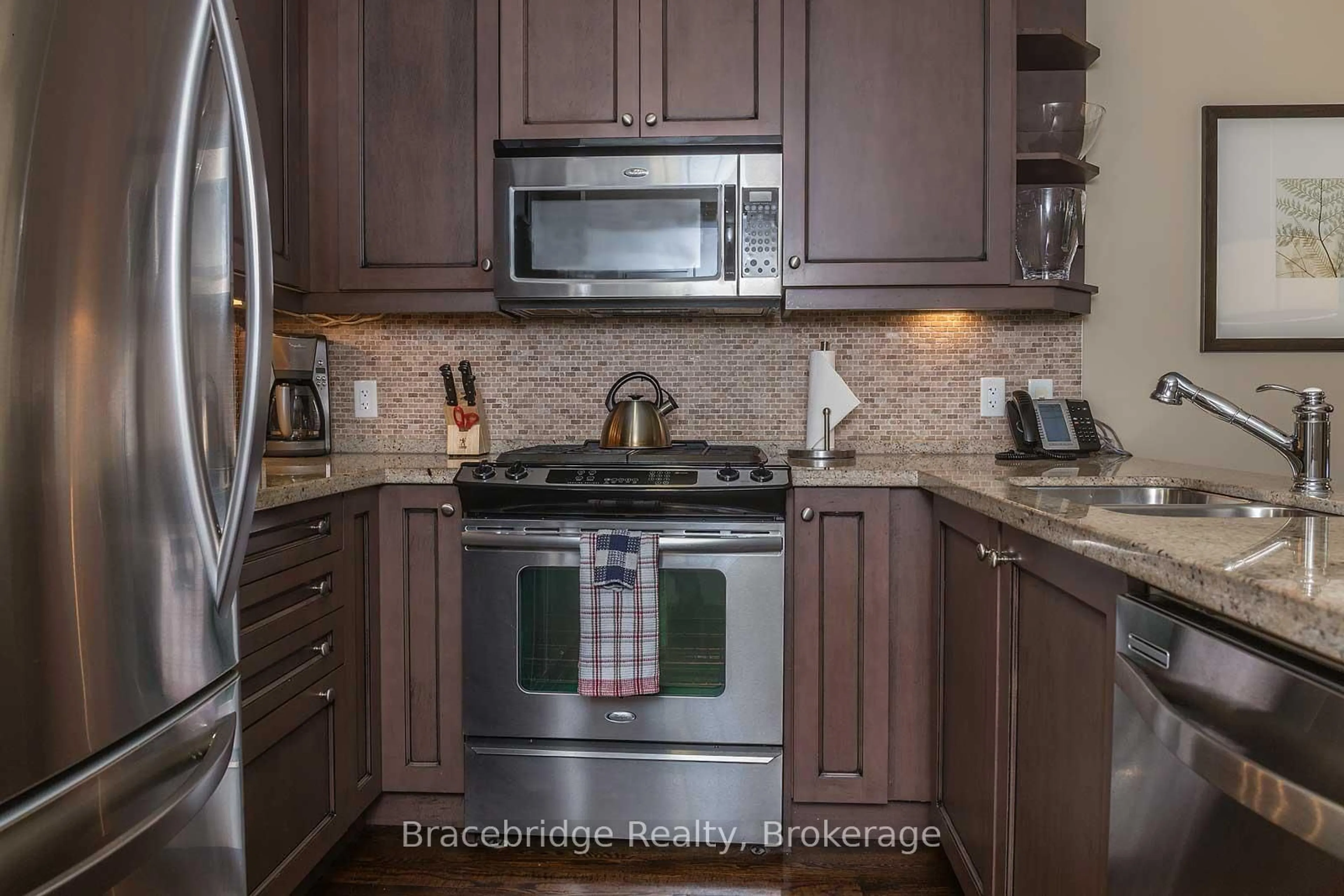 Standard kitchen, ceramic/tile floor for 1869 Muskoka Rd 118 Highway #A103-D1, Muskoka Lakes Ontario P1L 1W8