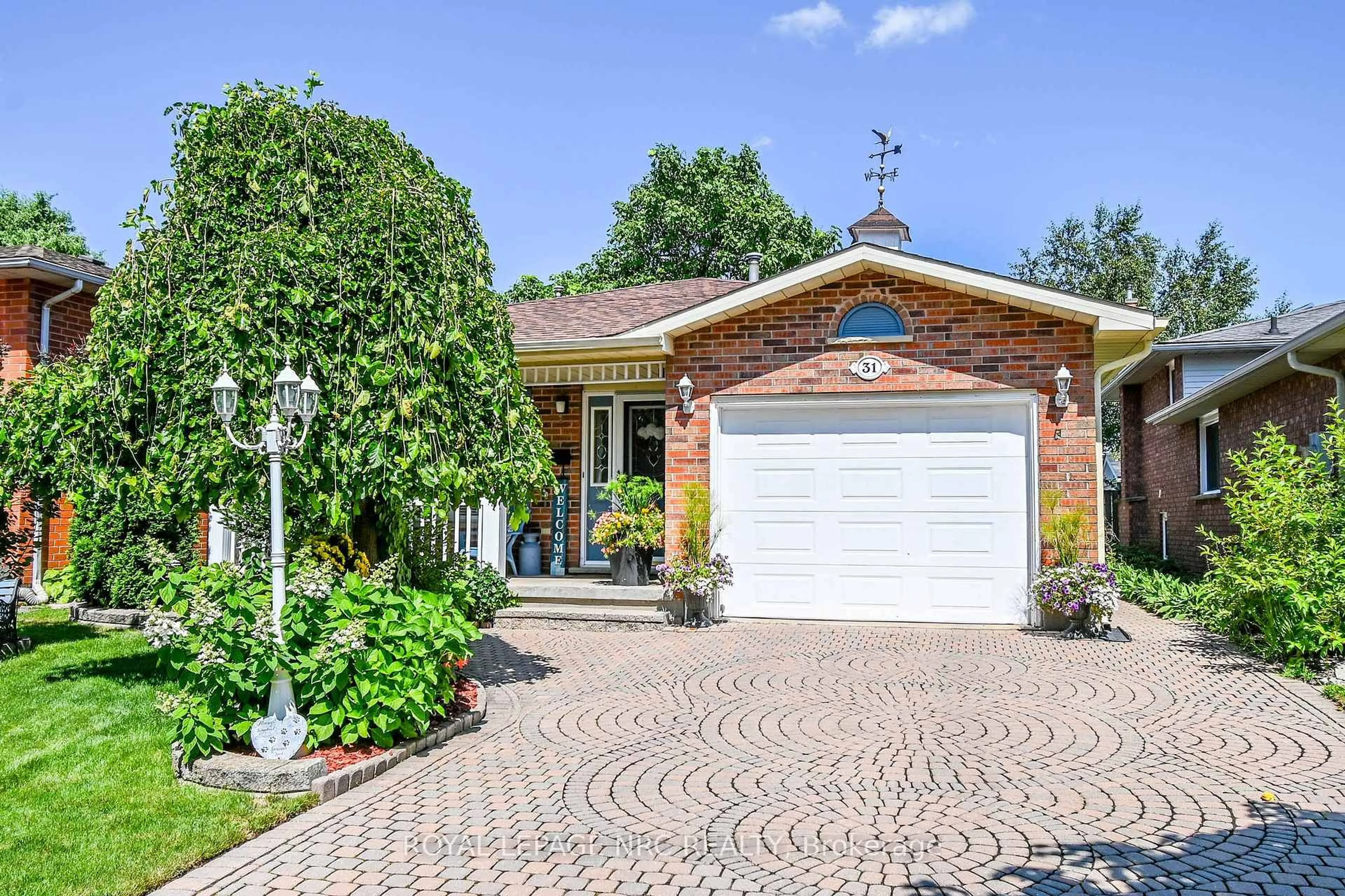 Home with brick exterior material, street for 31 Rollins Dr, Welland Ontario L3C 6Z8