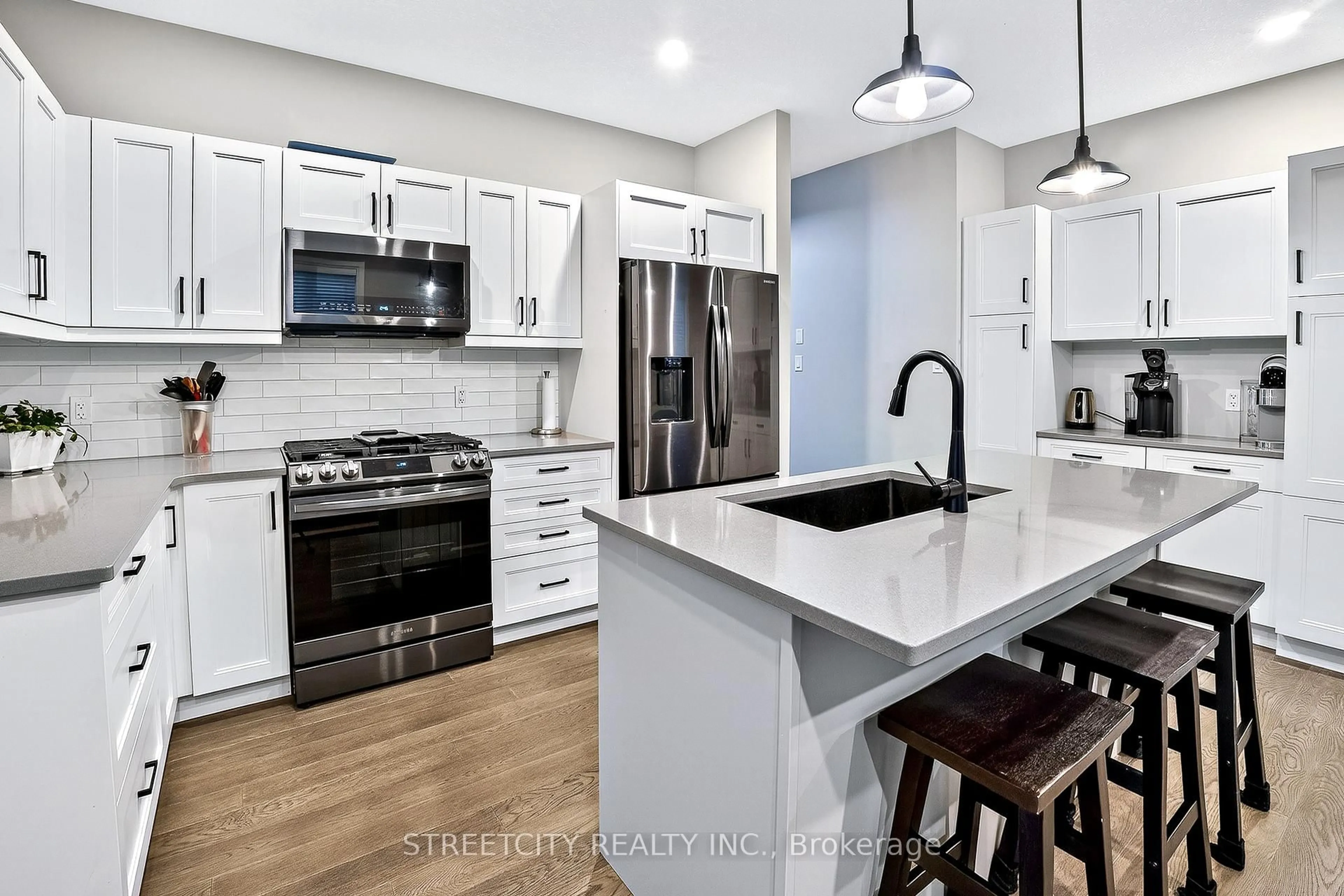 Open concept kitchen, ceramic/tile floor for 56 Compress Tr, Central Elgin Ontario L5G 4T8