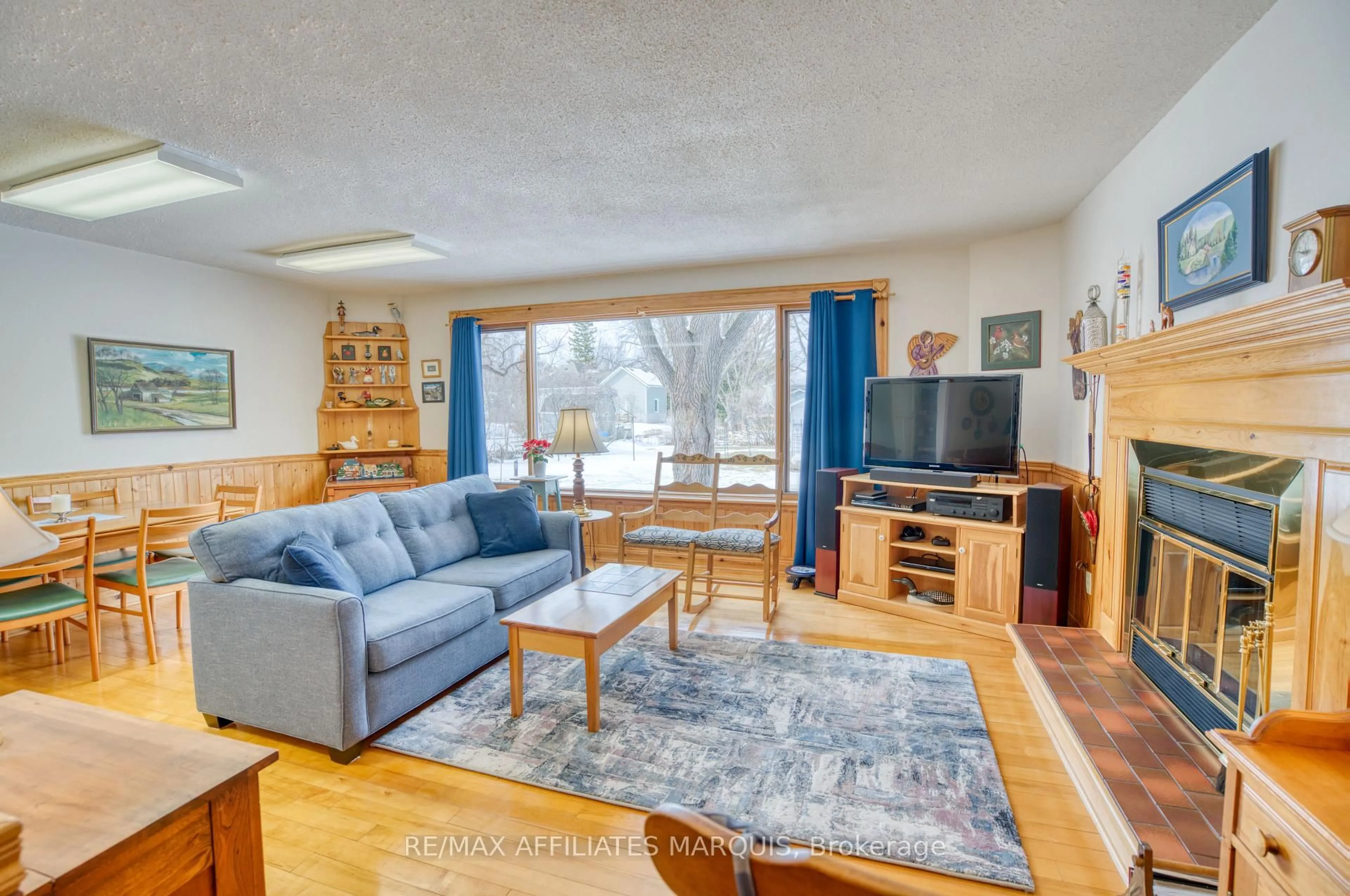 Living room with furniture, wood/laminate floor for 34 Church St, Westport Ontario K0G 1X0