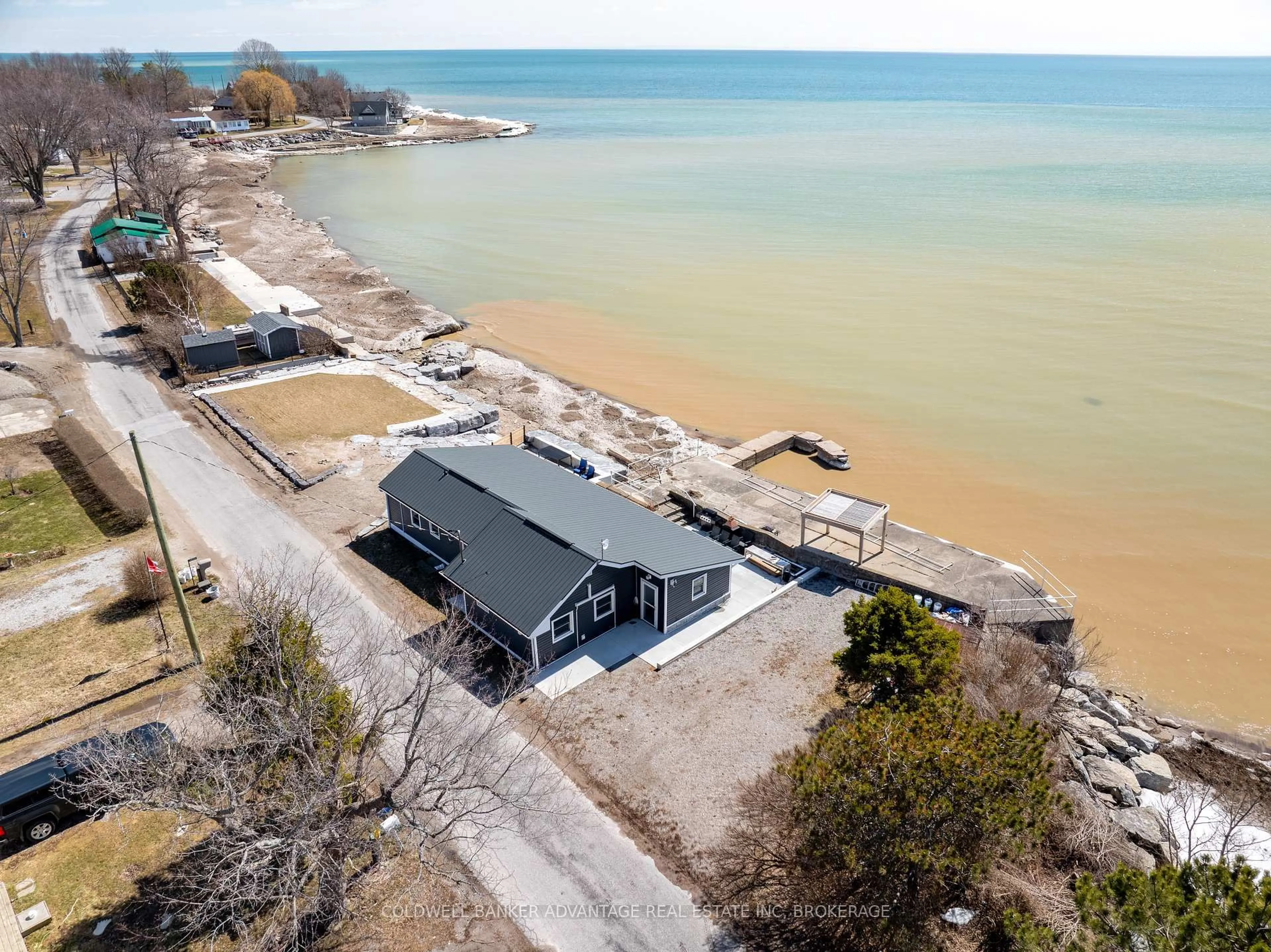 A pic from outside/outdoor area/front of a property/back of a property/a pic from drone, water/lake/river/ocean view for 1456 Lakeshore Rd, Haldimand Ontario N0A 1P0