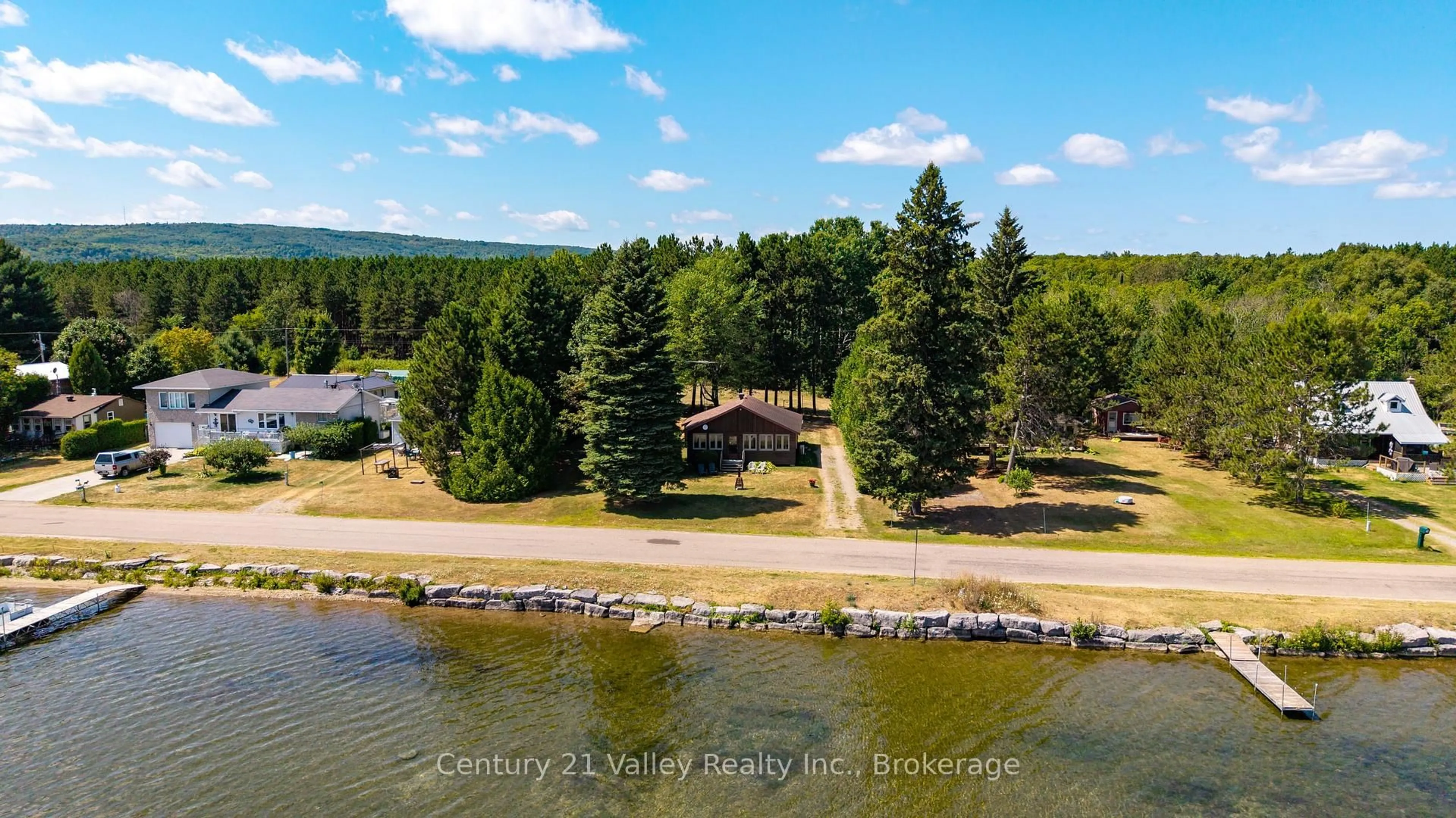 A pic from outside/outdoor area/front of a property/back of a property/a pic from drone, water/lake/river/ocean view for 1077 Lake Clear Rd, Eganville Ontario K0J 1T0