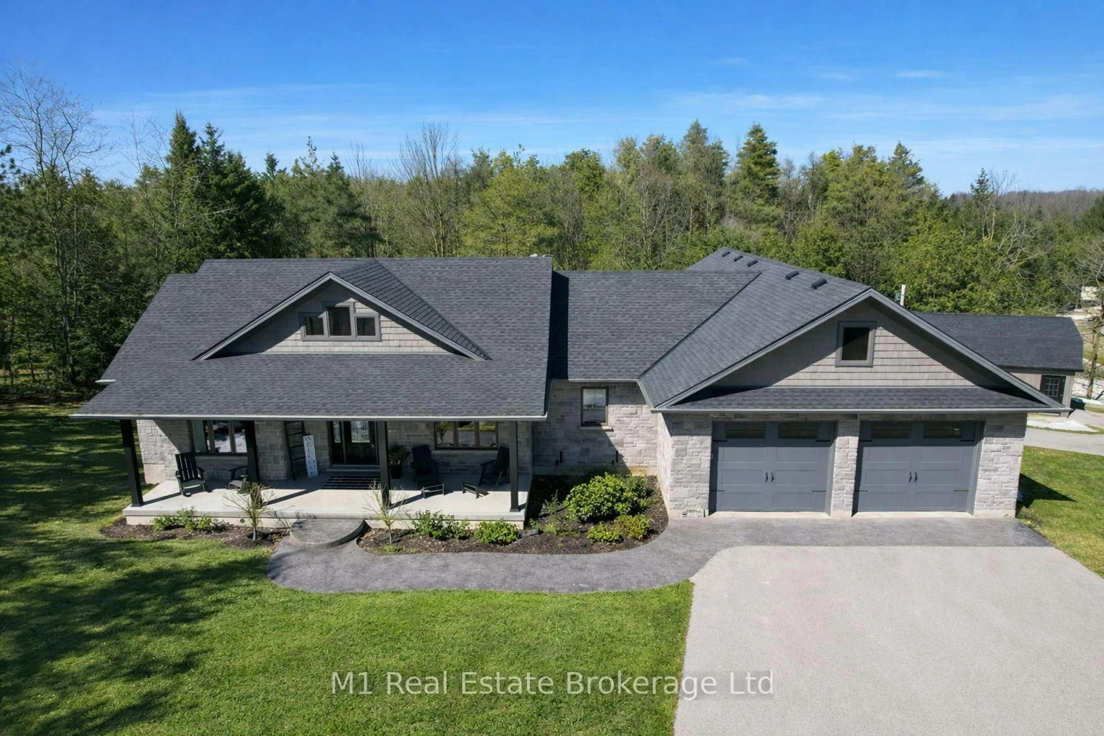 A pic from outside/outdoor area/front of a property/back of a property/a pic from drone, unknown for 6572 12 Line, Minto Ontario N0G 1Z0