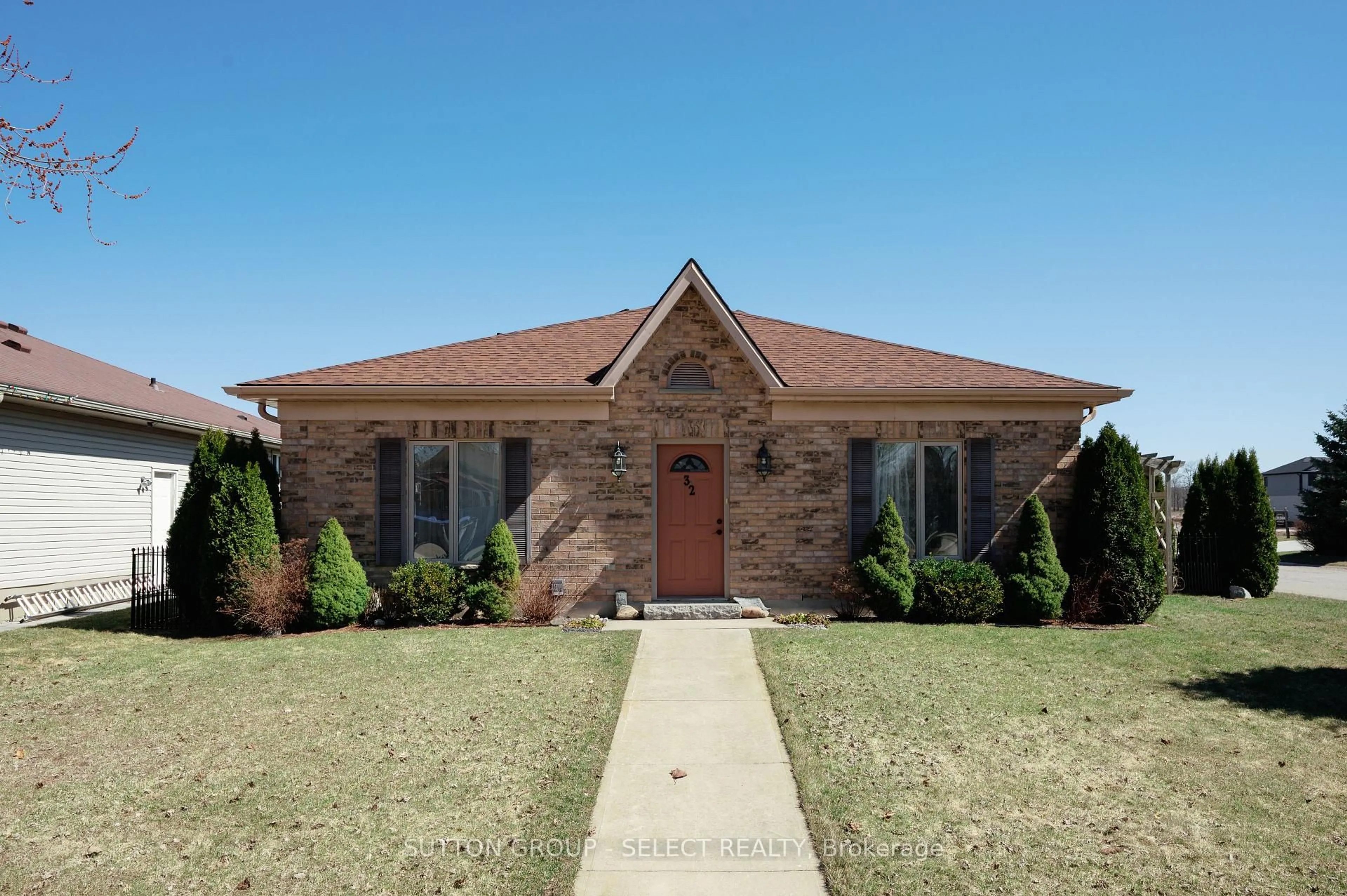 Home with brick exterior material, street for 32 Robin St, North Middlesex Ontario N0M 1A0